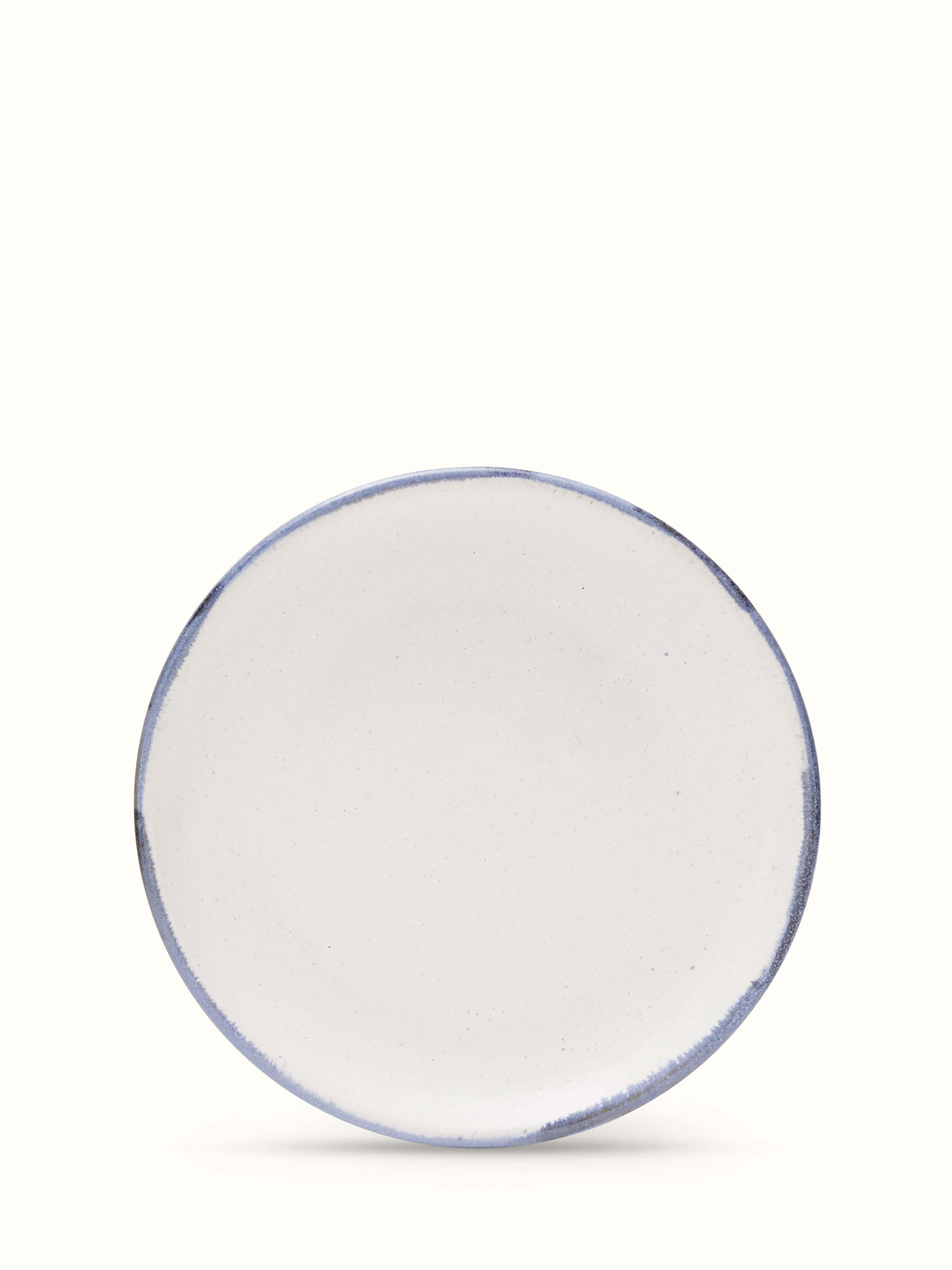 Front view of Studio pottery ceramic salad plate white