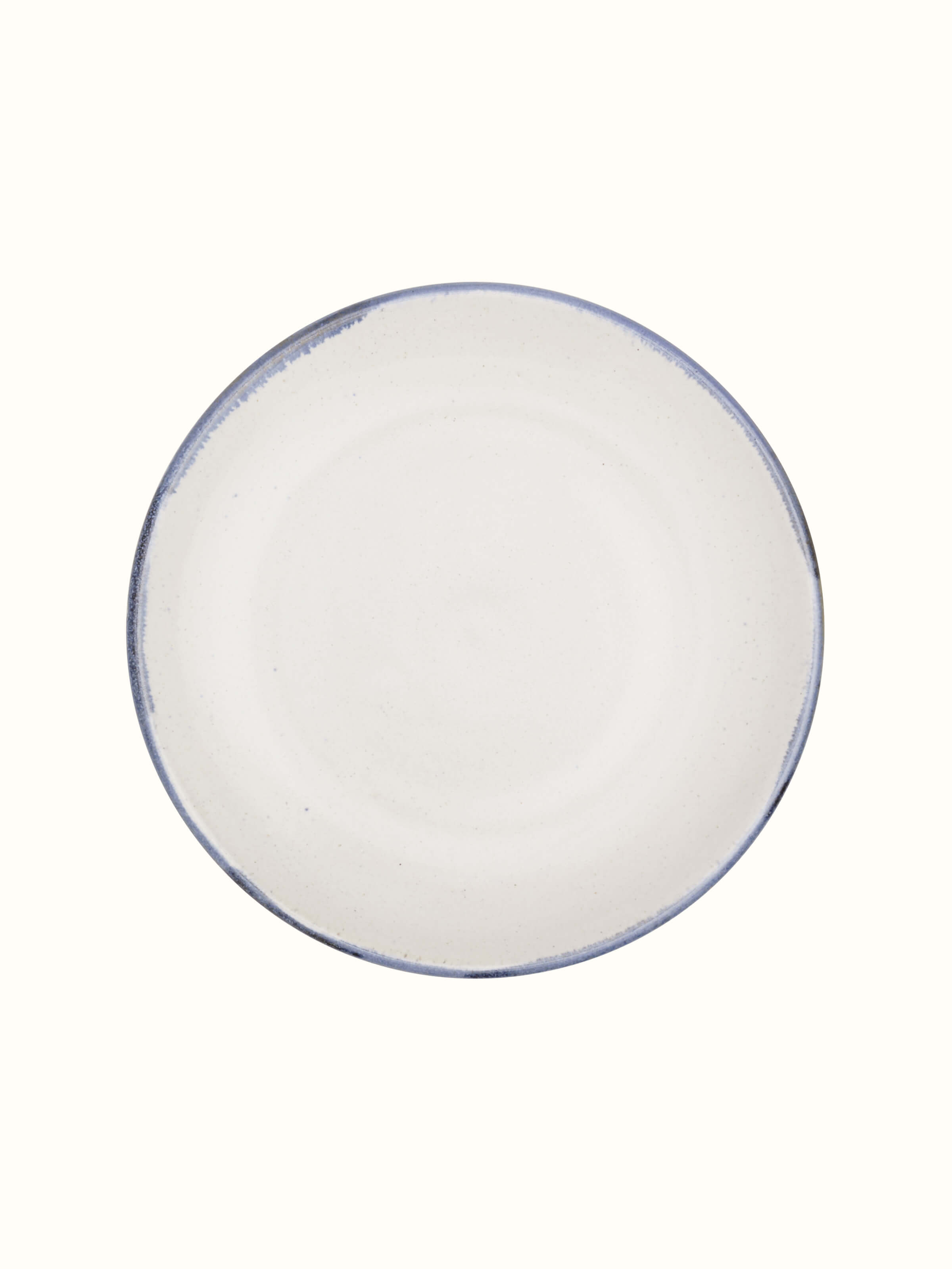 Angle view of Studio pottery ceramic salad plate white