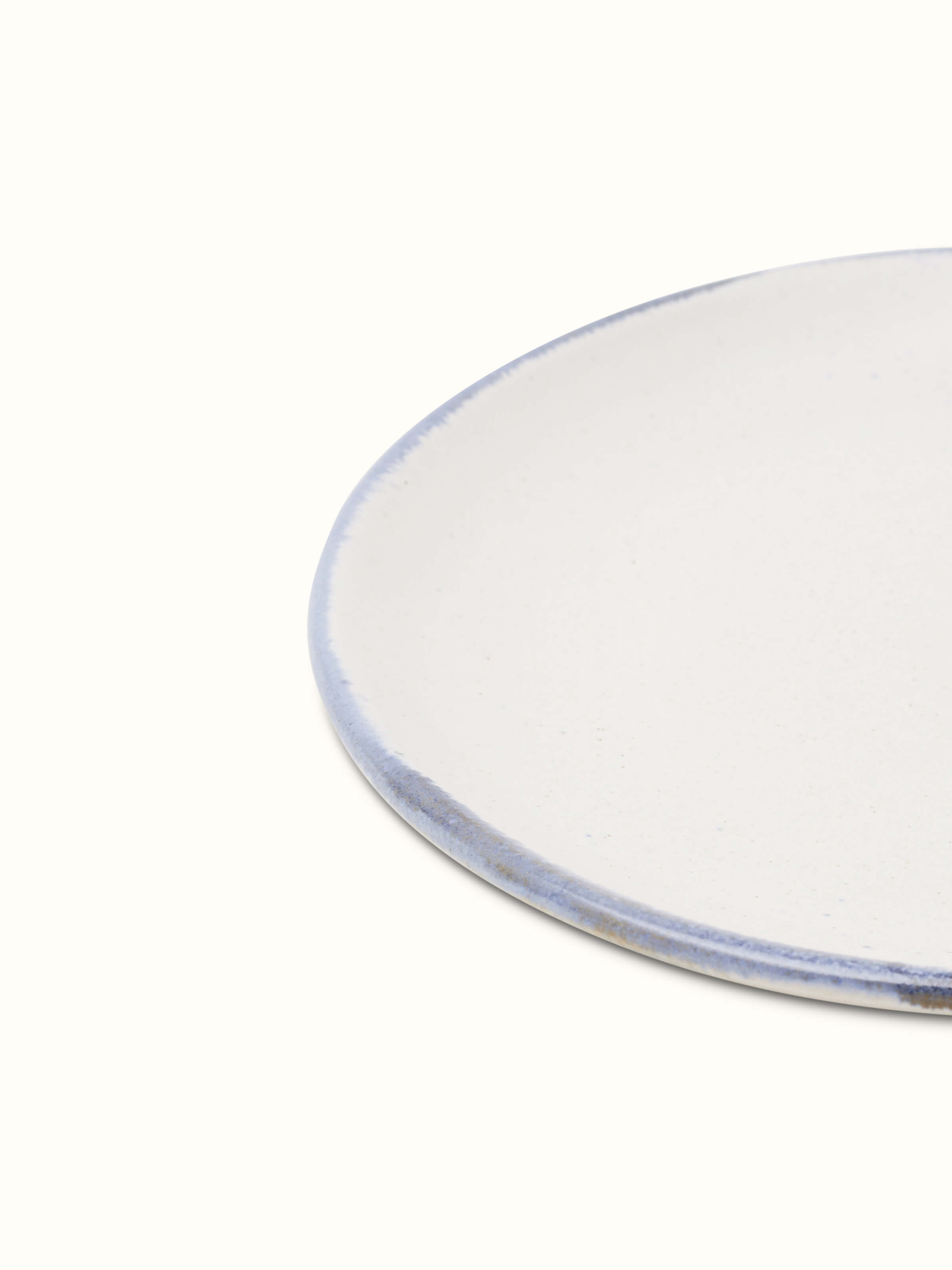 Detailed view of Studio pottery ceramic salad plate white
