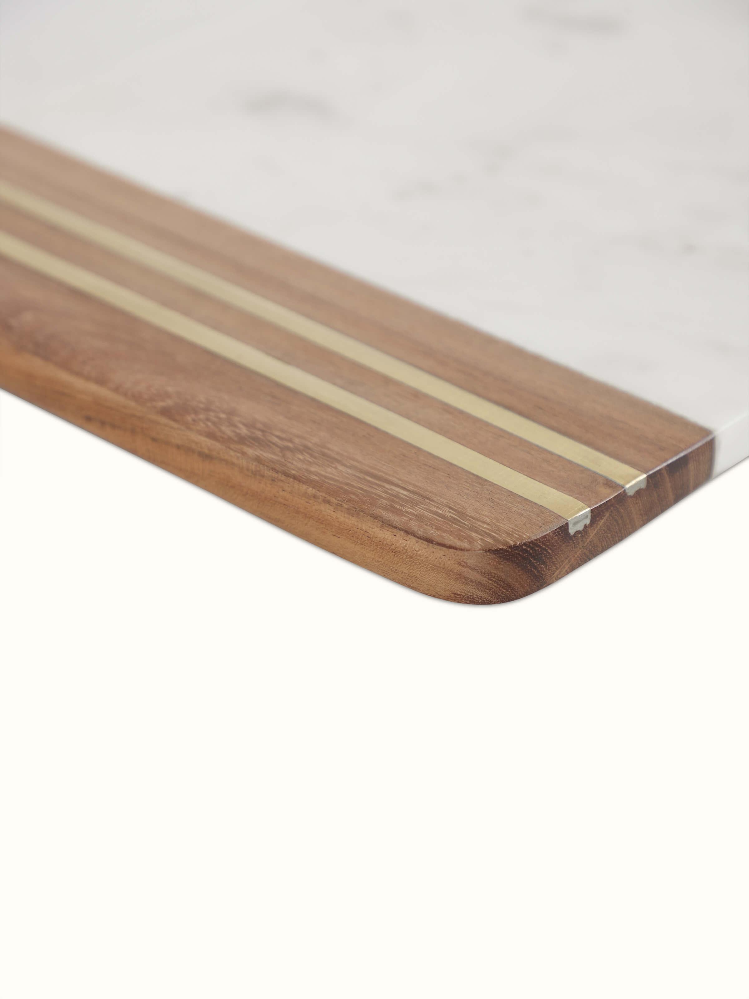 Detailed view of marble inlaid cheese board showcasing the precision of the inlay work.