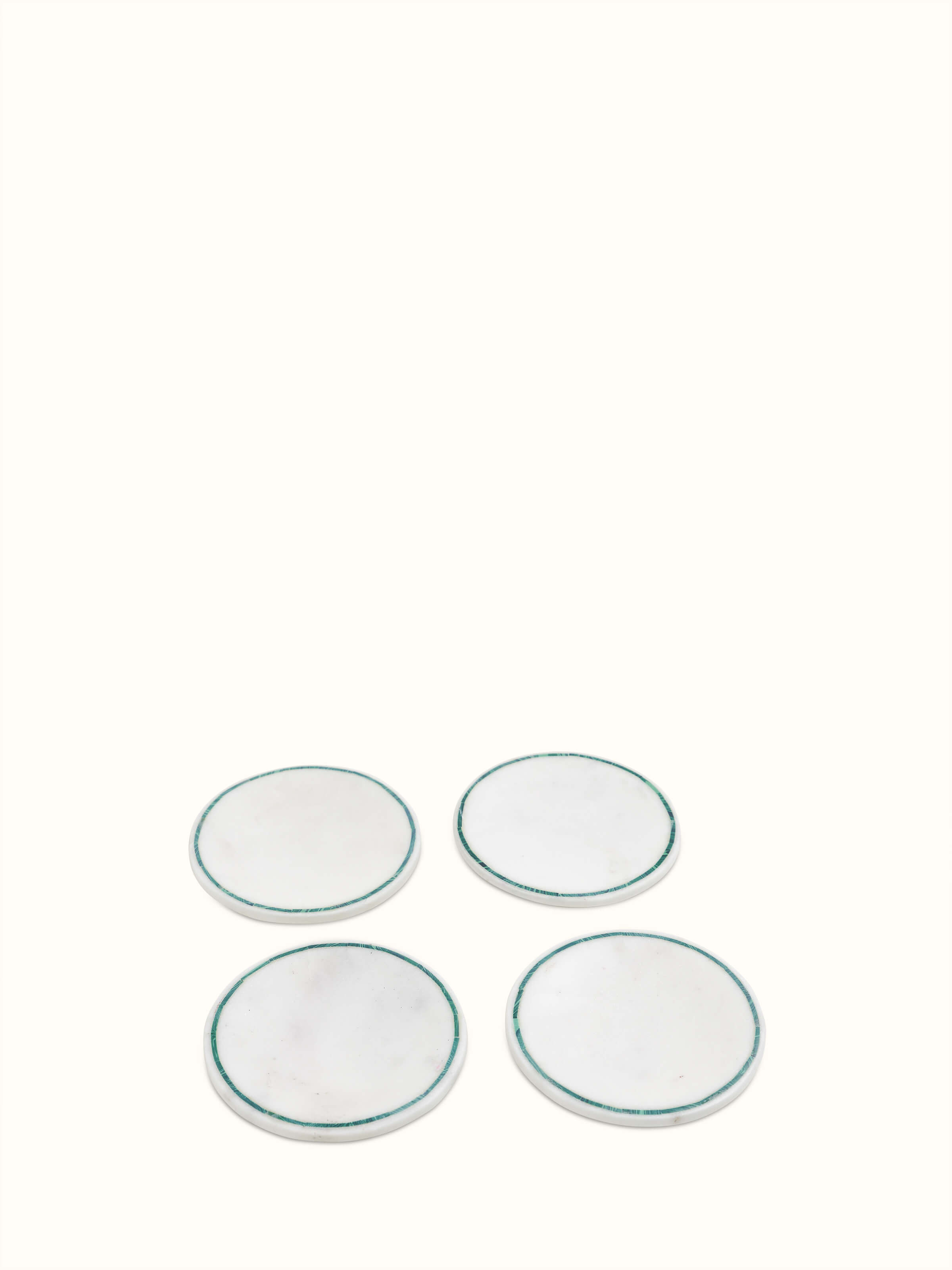 Side view of Marble Inlaid Coasters set featuring smooth edges and inlaid patterns