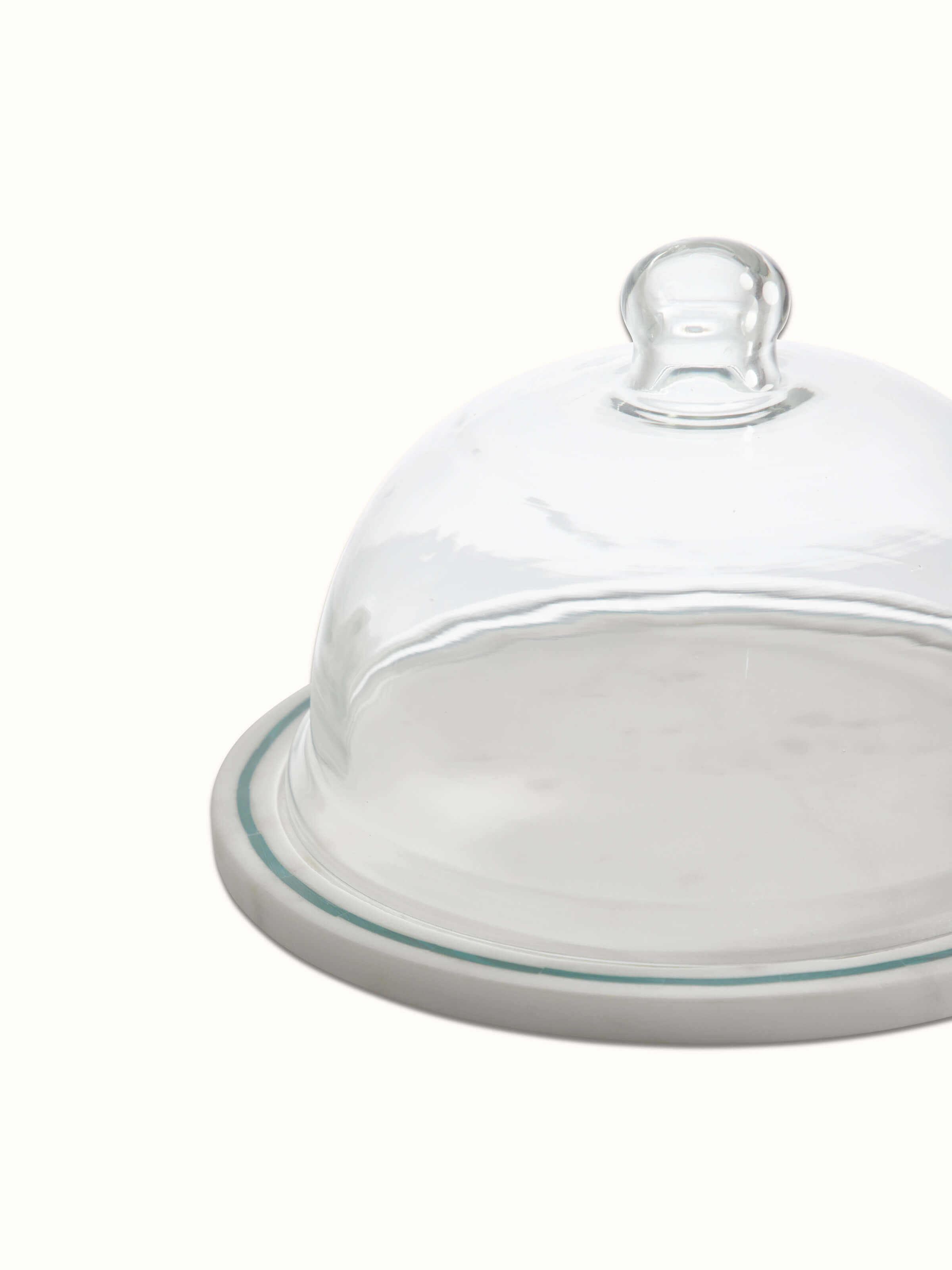 Detail view of Marble Inlaid Cloche focusing on the fine marble inlay craftsmanship and finish.