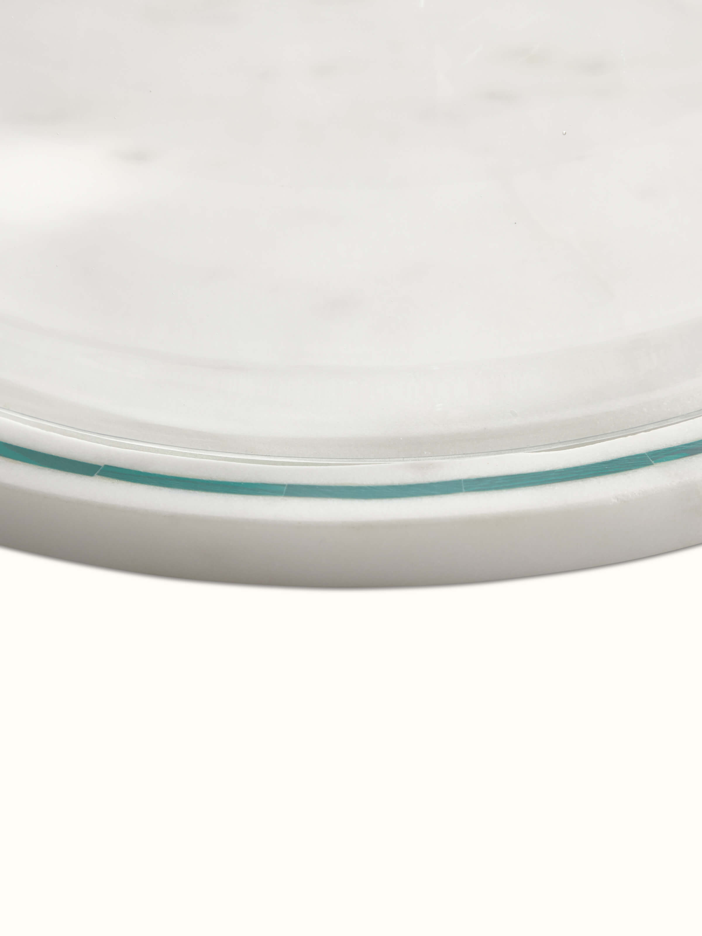 Close-up view of Marble Inlaid Cloche emphasizing the detailed marble inlay and texture.