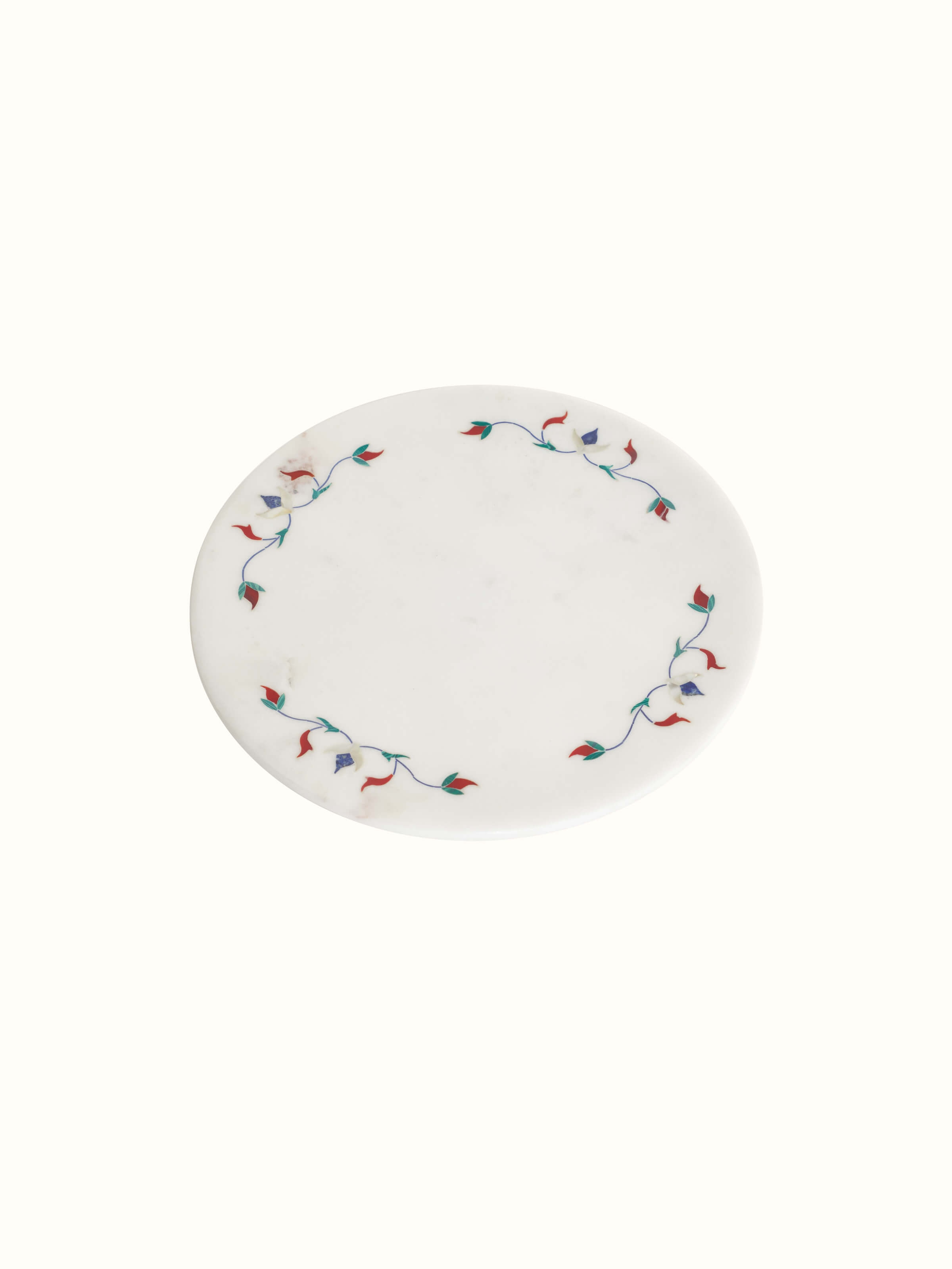Detailed view of marble inlaid circular cake stand, focusing on the elegant floral patterns and craftsmanship.