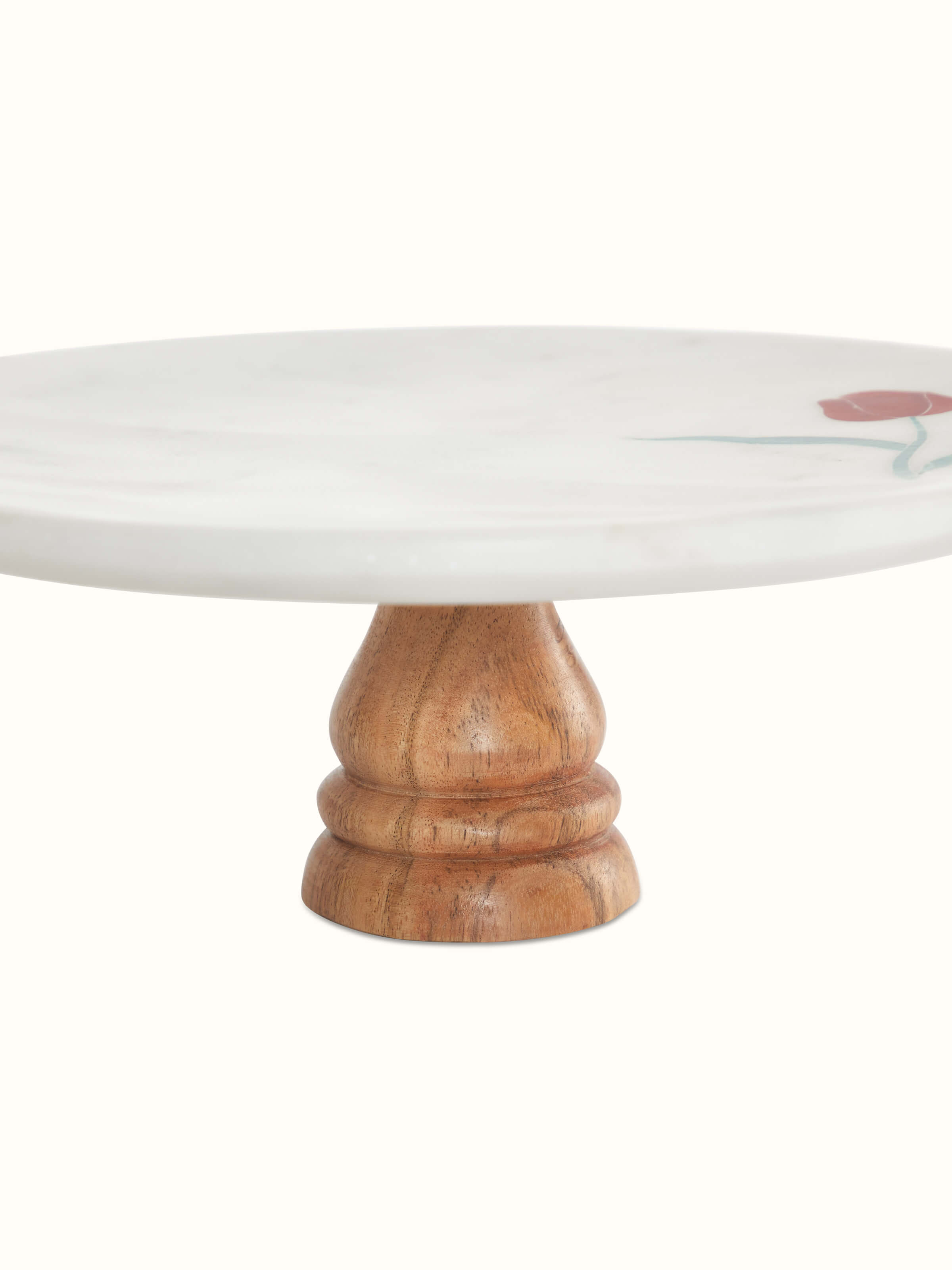 Bottom view of marble inlaid cake stand highlighting the base construction and smooth finish