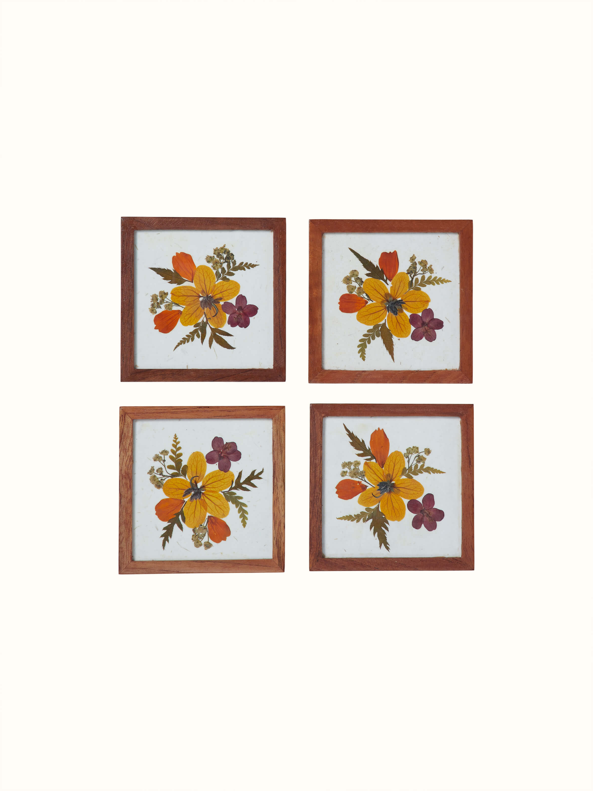 Front view of Handmade paper floral coasters (4 pcs) featuring delicate floral designs and vibrant colors