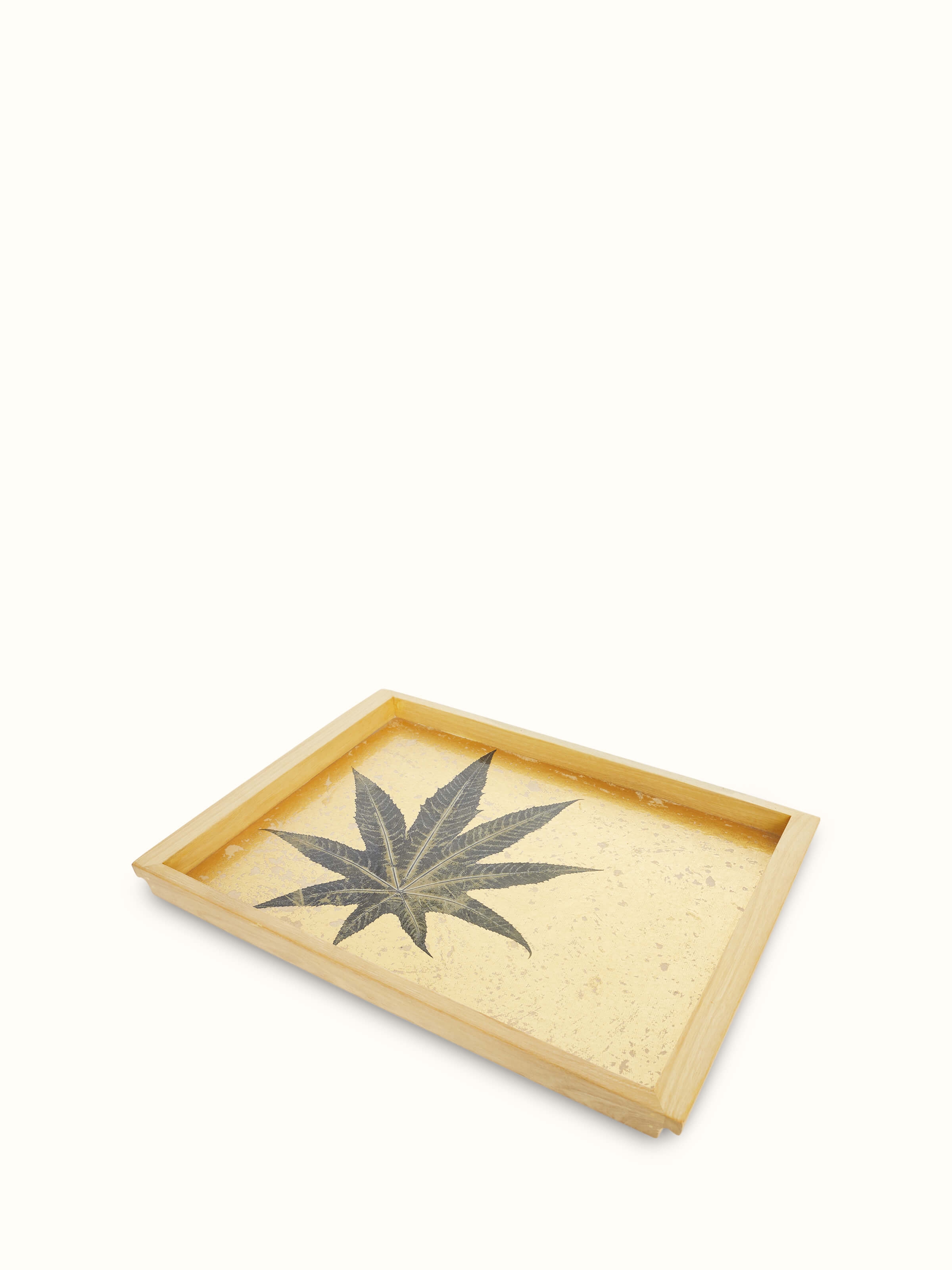 Angled view of Auroville handmade paper chinar tray showing detailed chinar pattern and sustainable design.