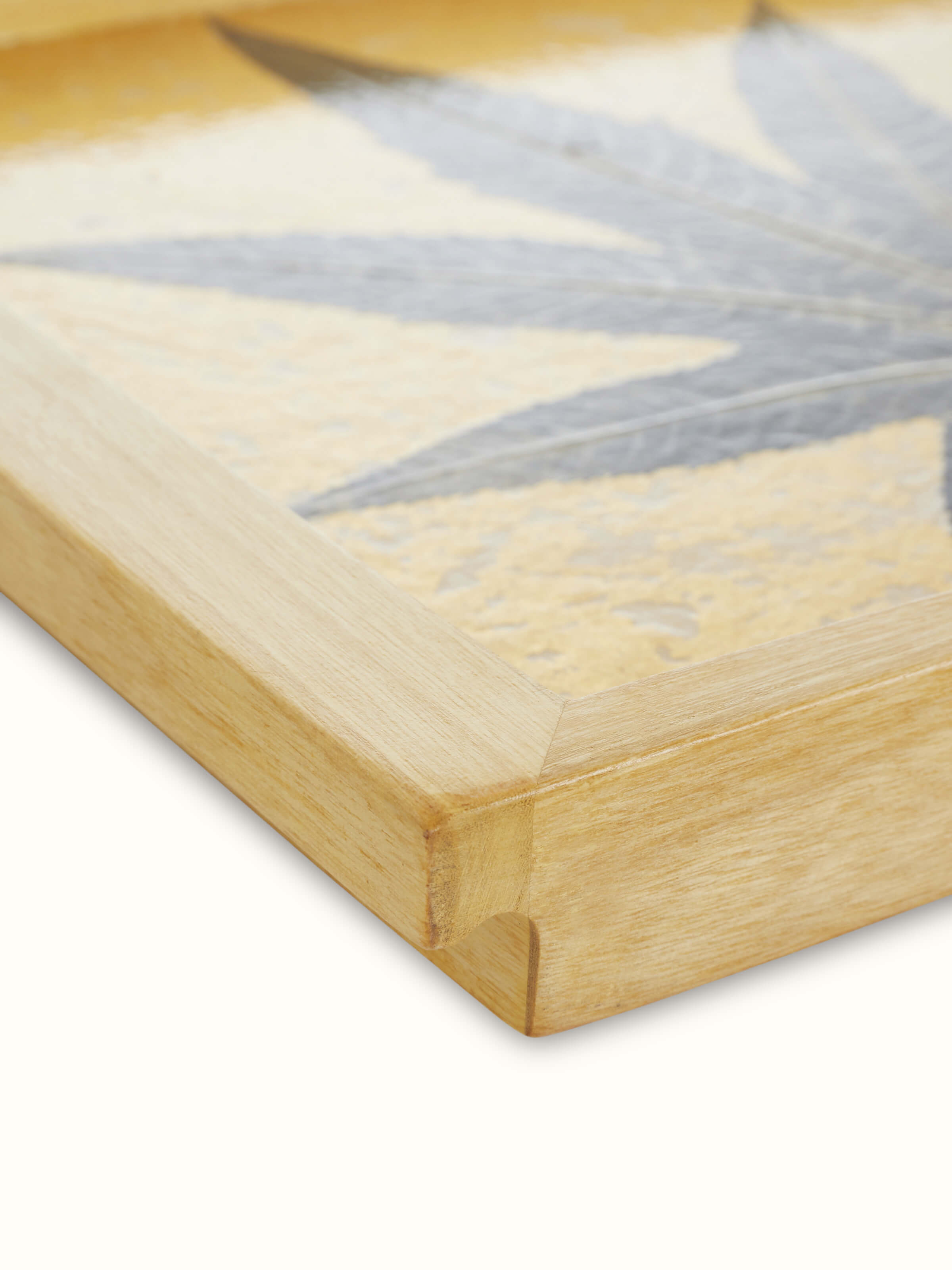 Close-up of Auroville handmade paper chinar tray highlighting eco-friendly materials and detailed chinar leaf design.