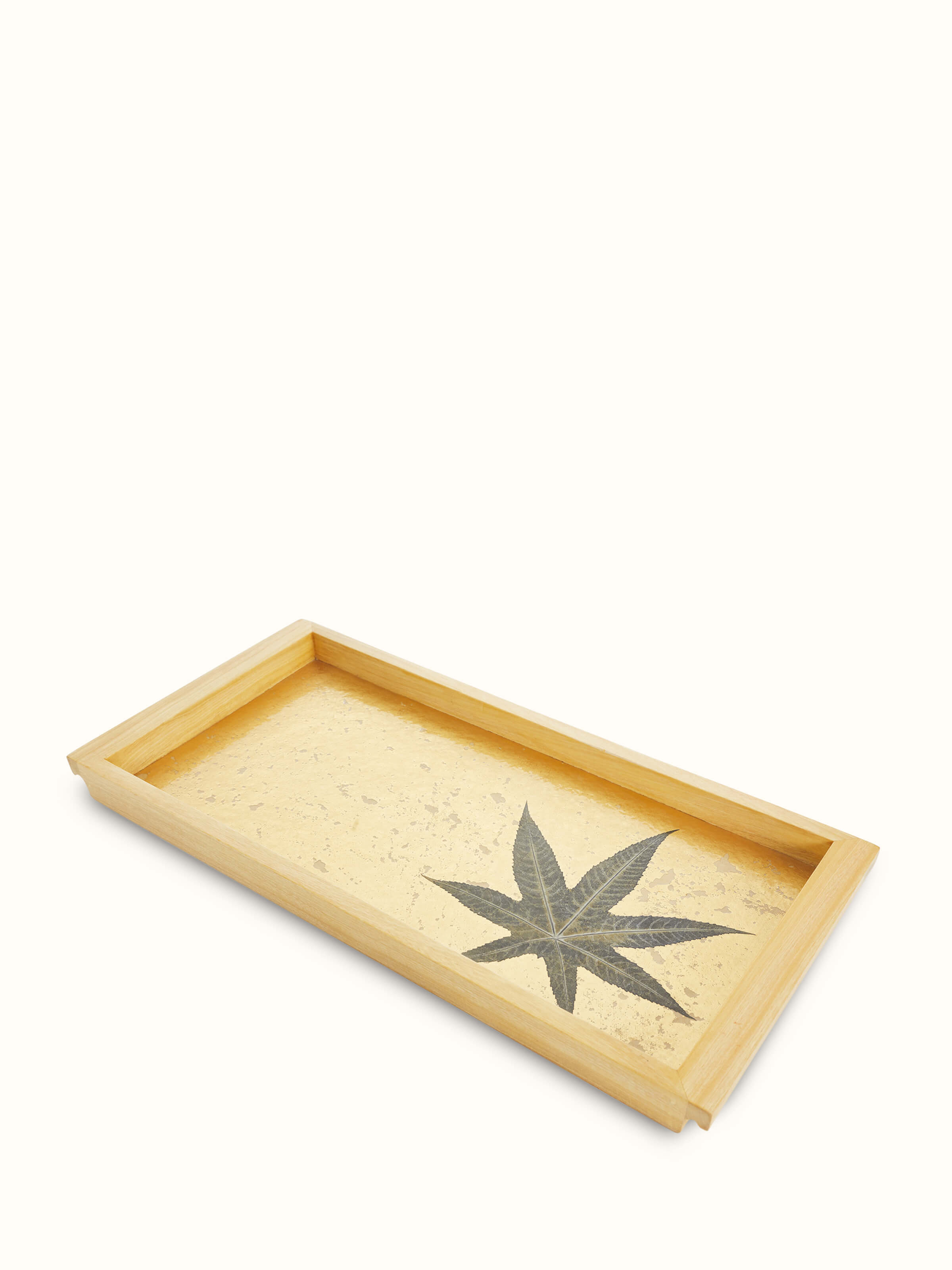 Angled view of Auroville handmade paper chinar tray (18 x 10 inches) featuring its artistic patterns and paper quality