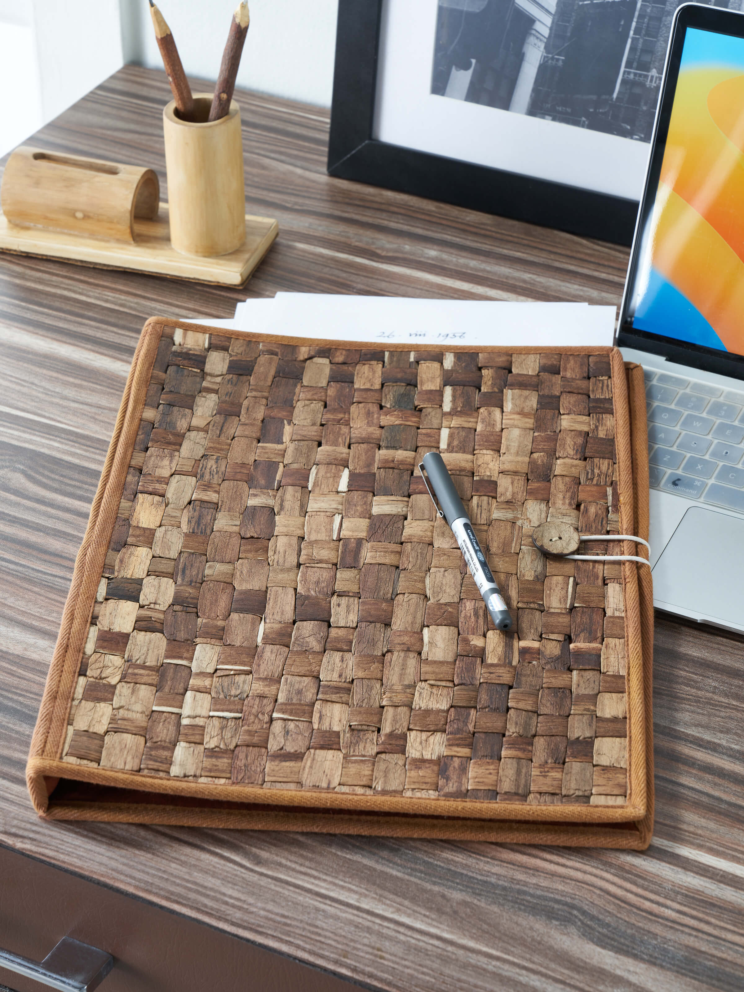 Side view of Bamboo Sustainable File Folder in brown highlighting the natural texture and design.