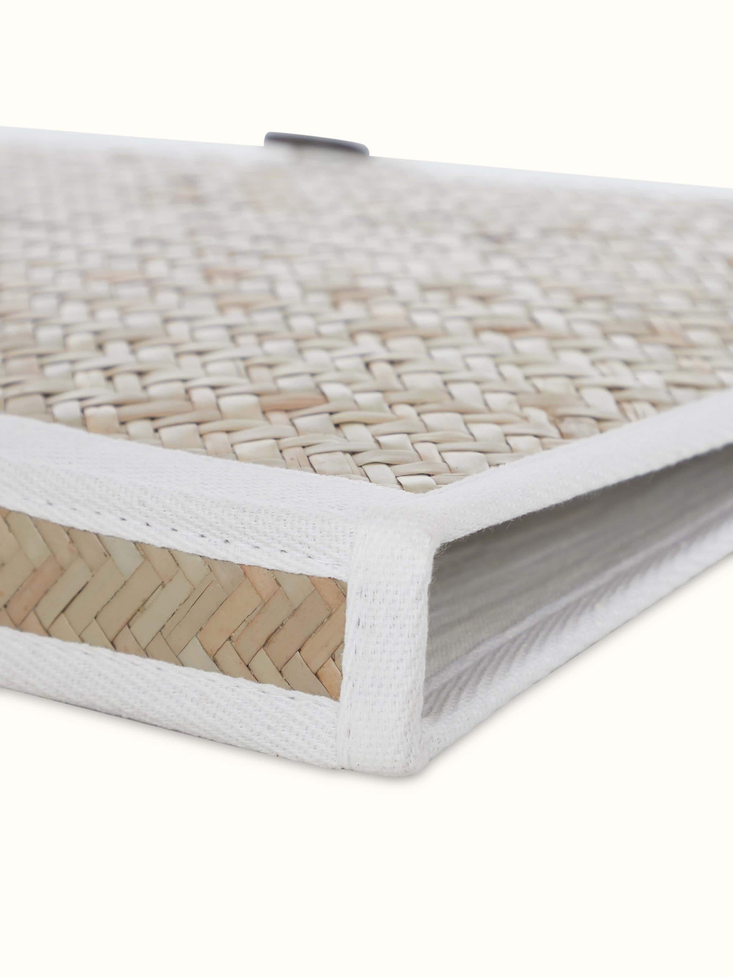 Detailed shot of bamboo sital patti file folder in brown showing close-up of the weave and texture.