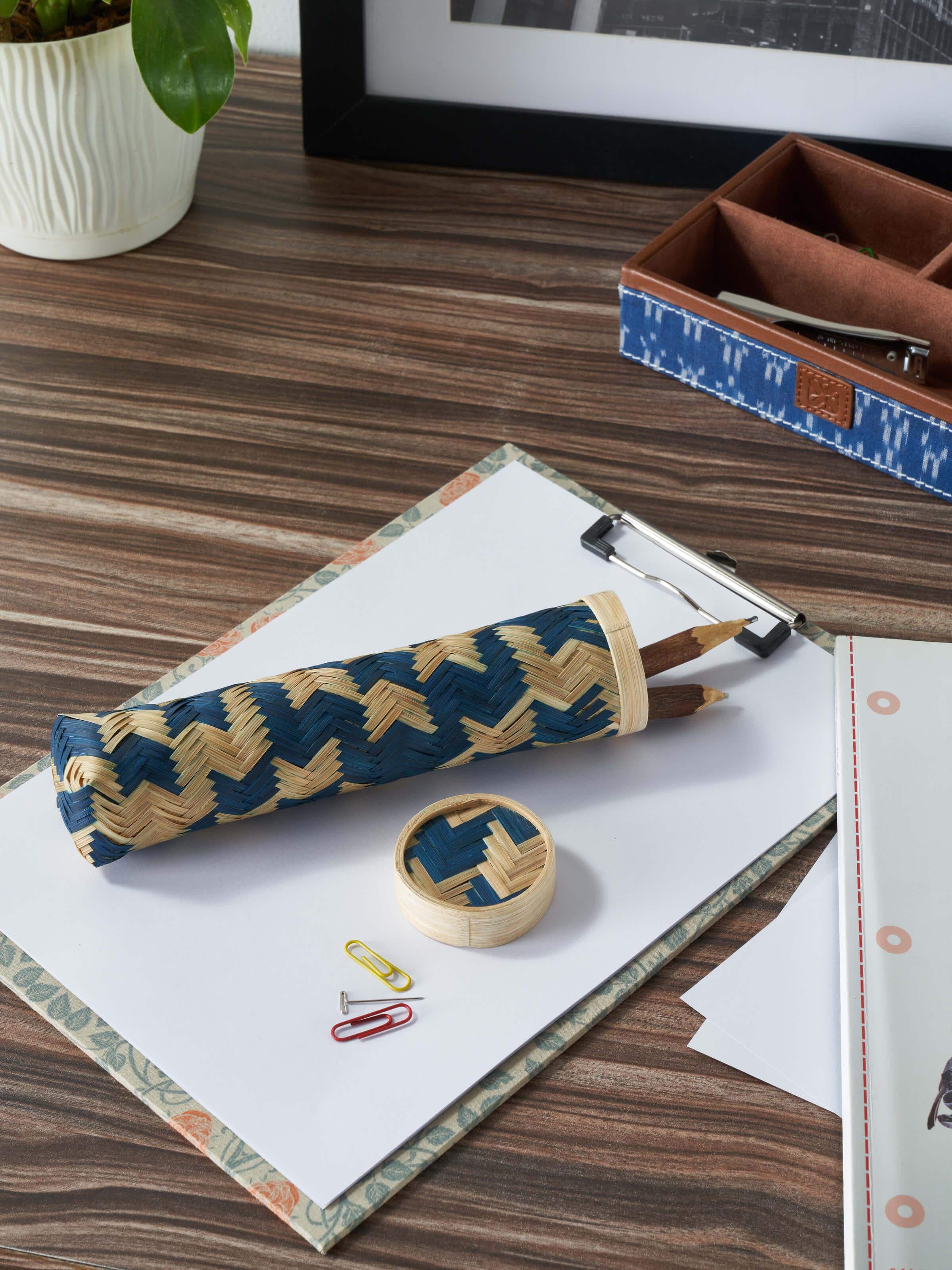 Front view of a blue bamboo stationery box, highlighting its sleek design and practical compartments.