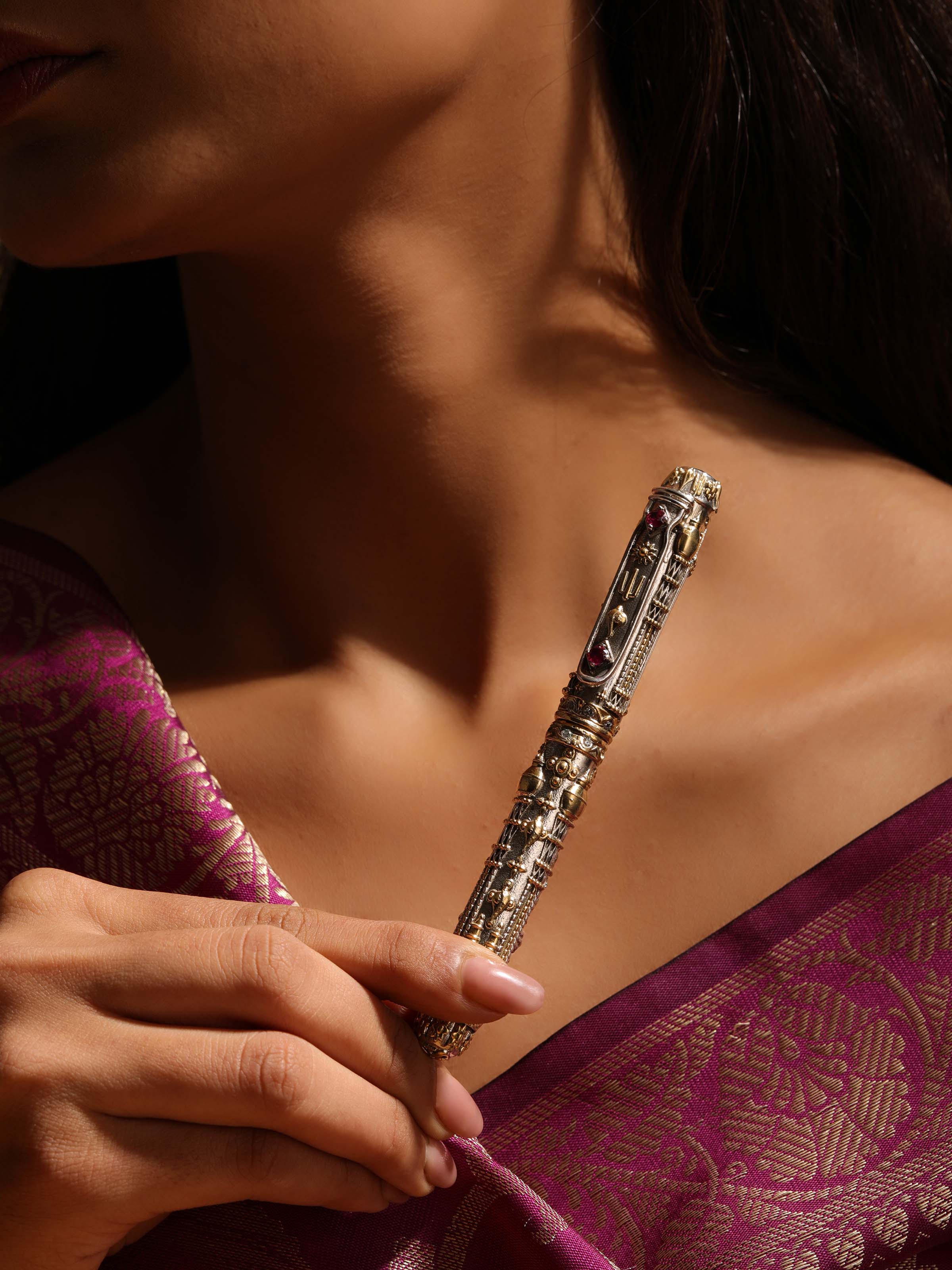Side view of Lord Balaji Silver Smithing Pen showcasing its delicate detailing and graceful design.