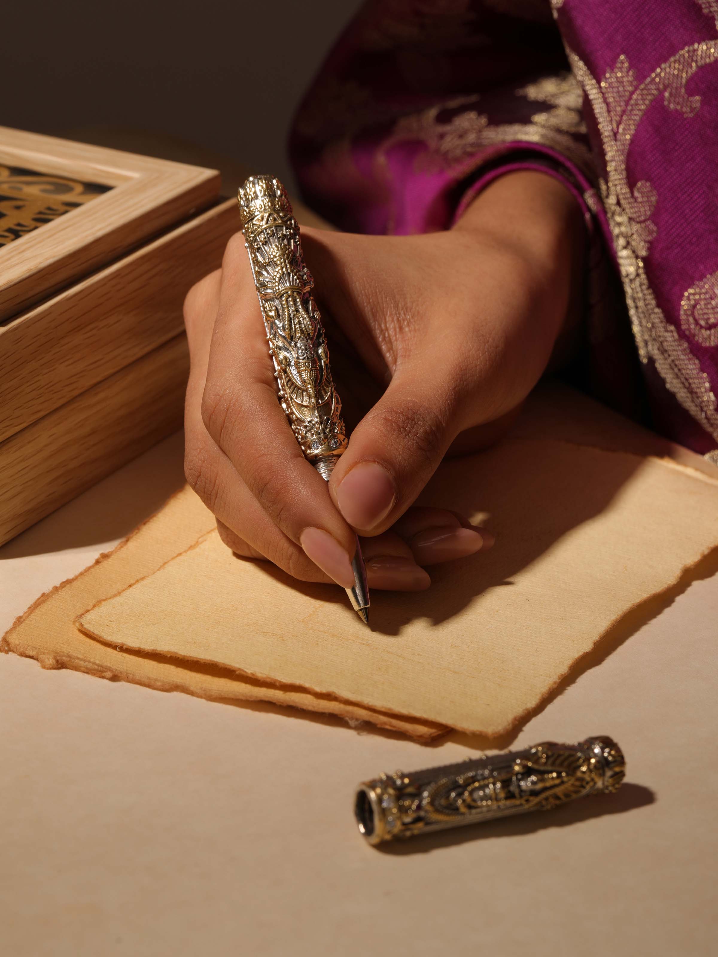 Close-up view of Lord Balaji Silver Smithing Pen emphasizing the intricate craftsmanship and polished finish.