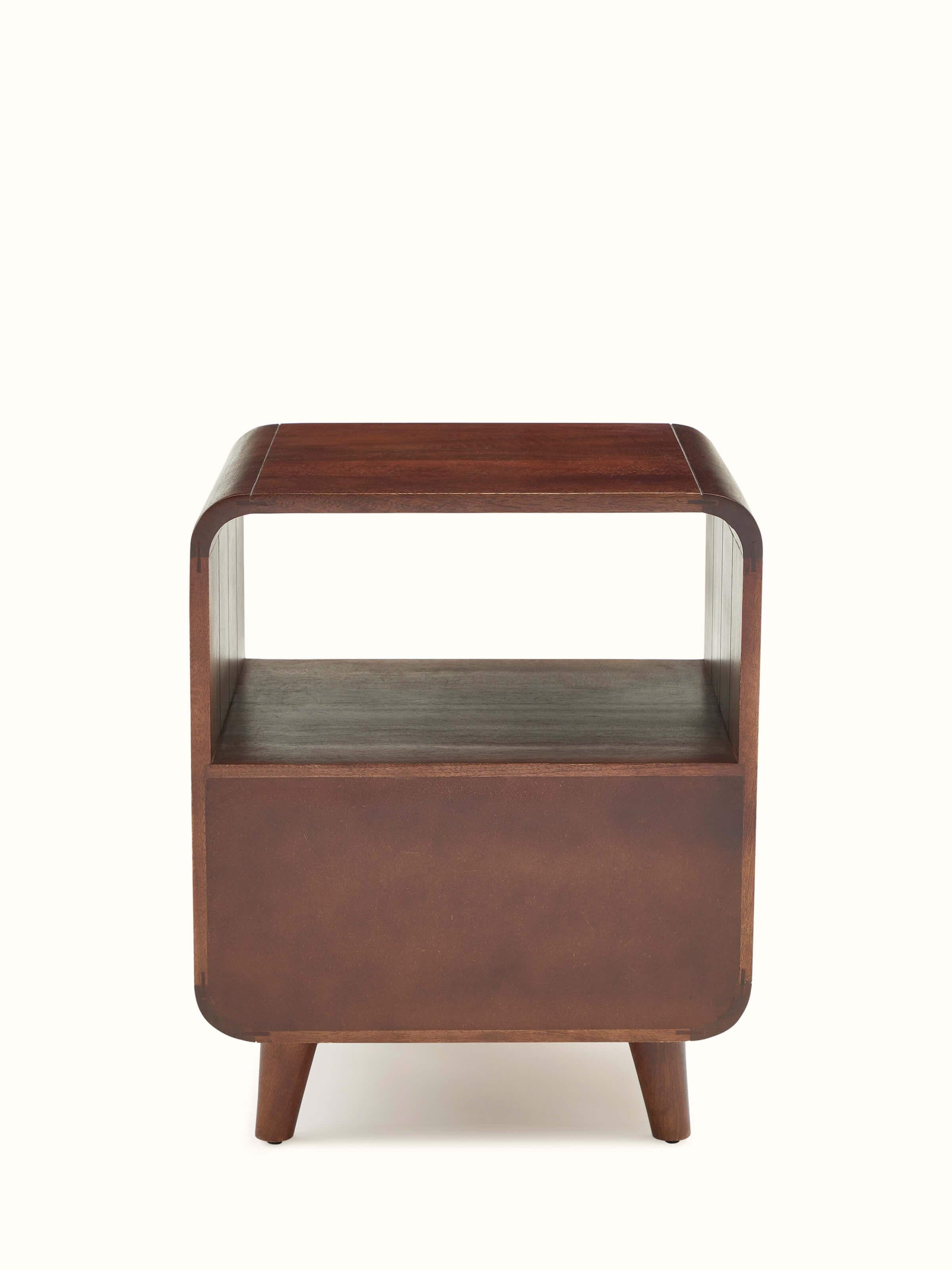 Close-up of the mango wood and cane bedside table from a different angle, showcasing the texture and natural wood grain.