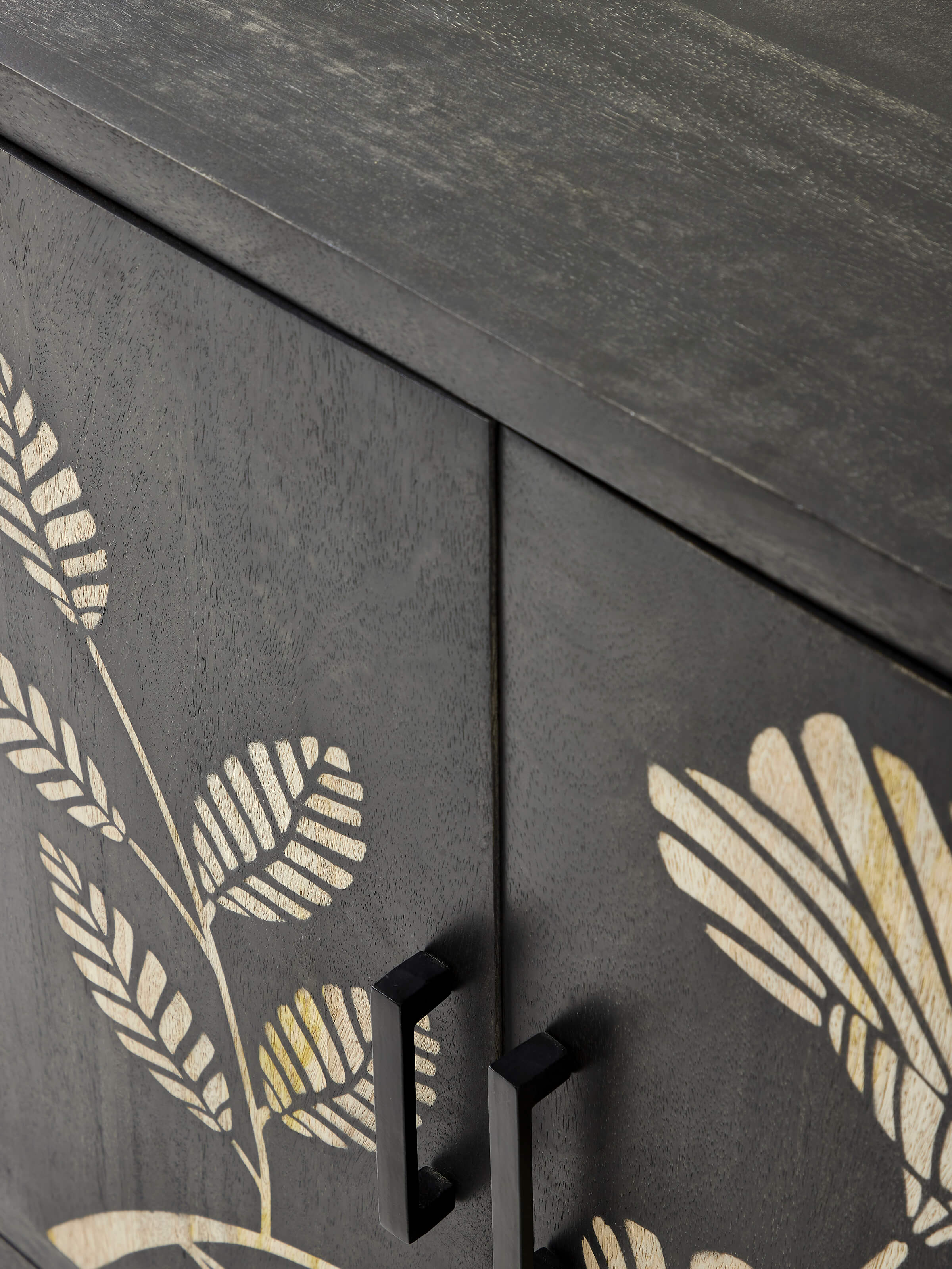 Top-down view of Sand etched mango wood sideboard, showing the surface etching and overall design