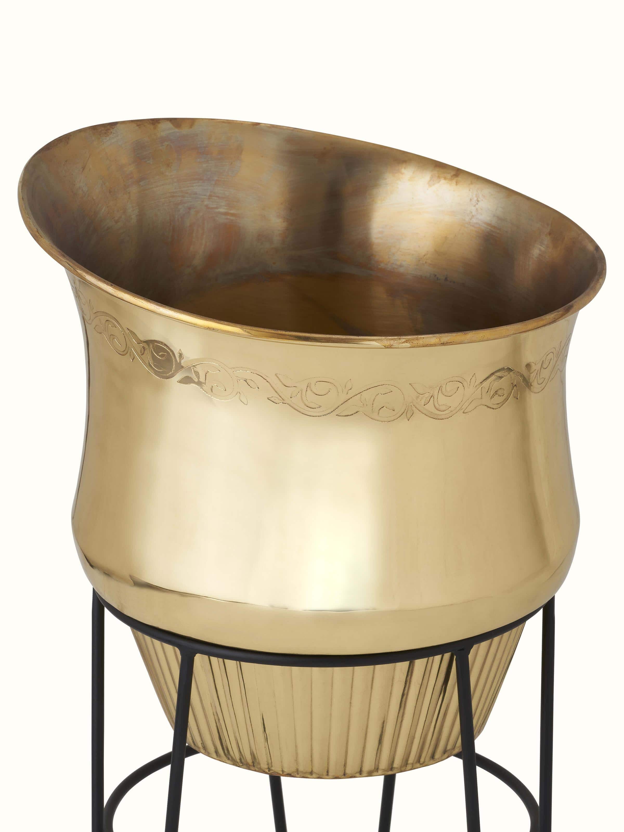 Close-up of Glossy Brass Planter, emphasizing the smooth texture and polished finish
