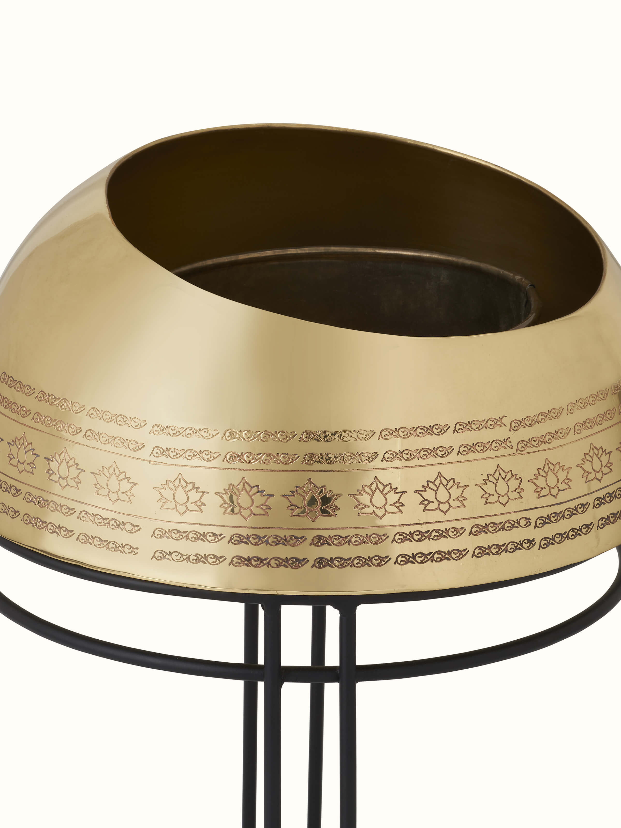 Close-up view of Brass planter emphasizing its intricate patterns and smooth surface