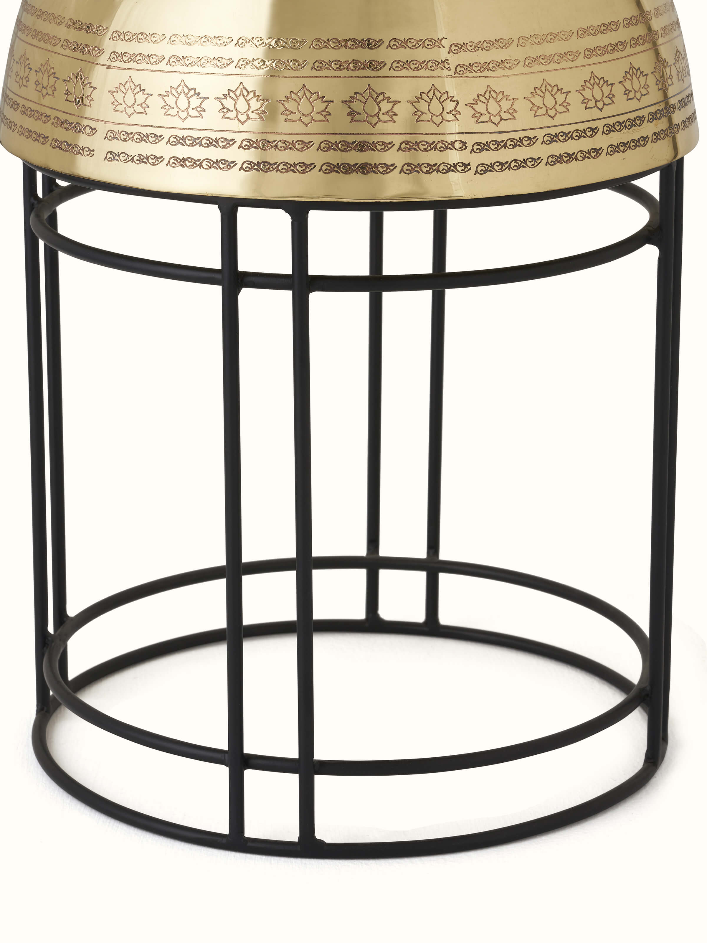 Angled view of Brass planter focusing on its unique shape and refined detailing