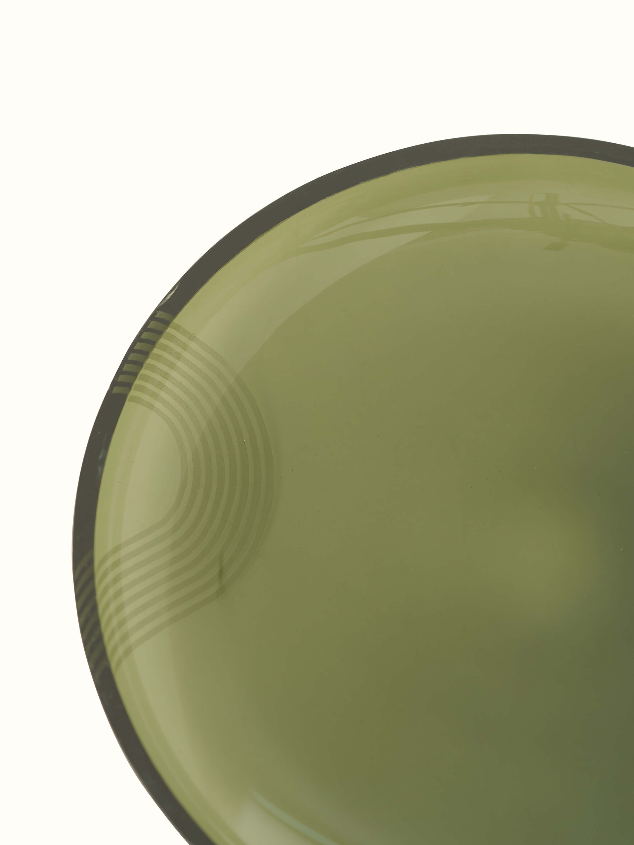 Alternate view of Firozabadi Glass Dinner Plate in green showcasing different angles and reflections.