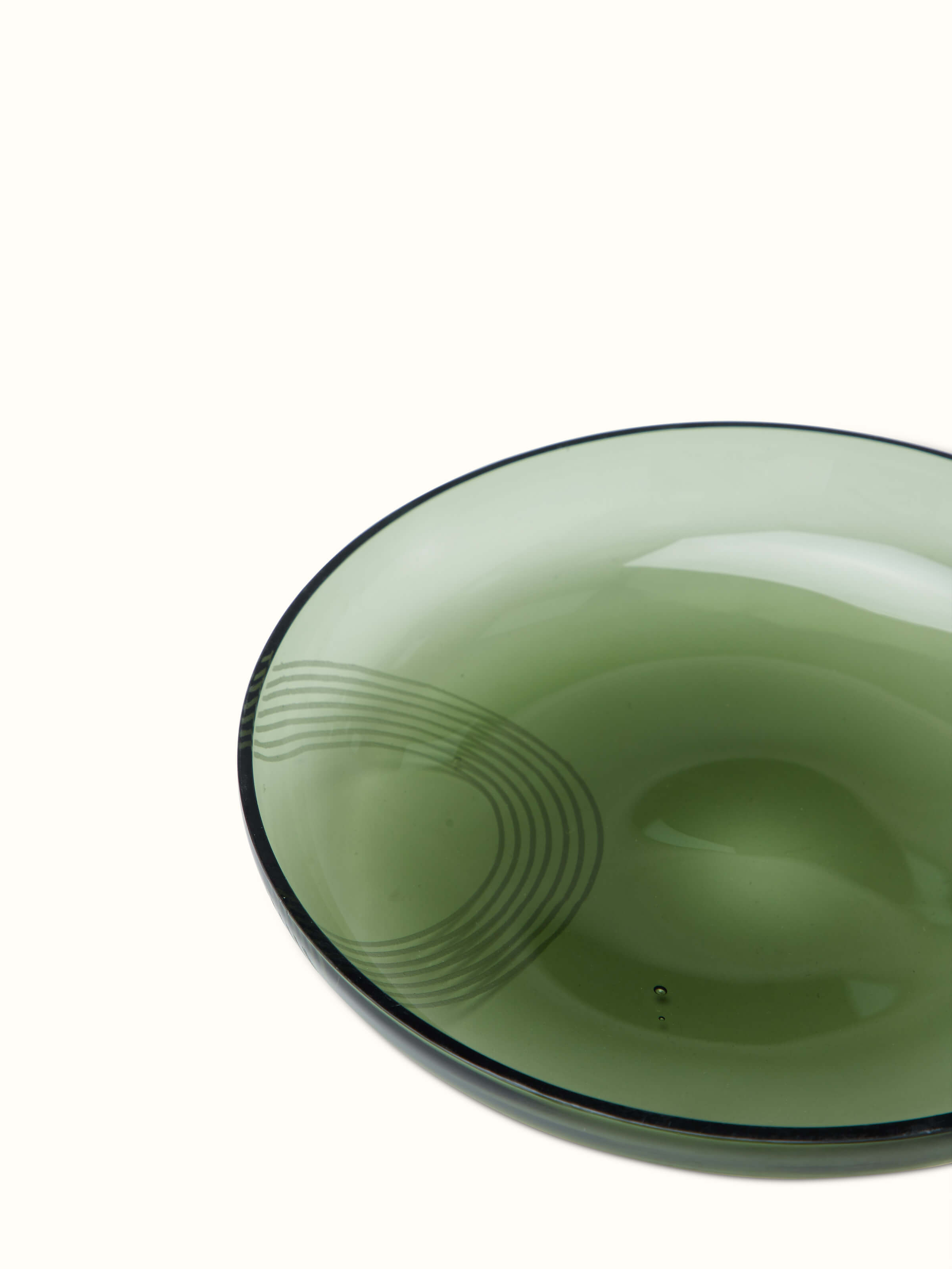 Detailed view of Firozabadi glass salad plate green