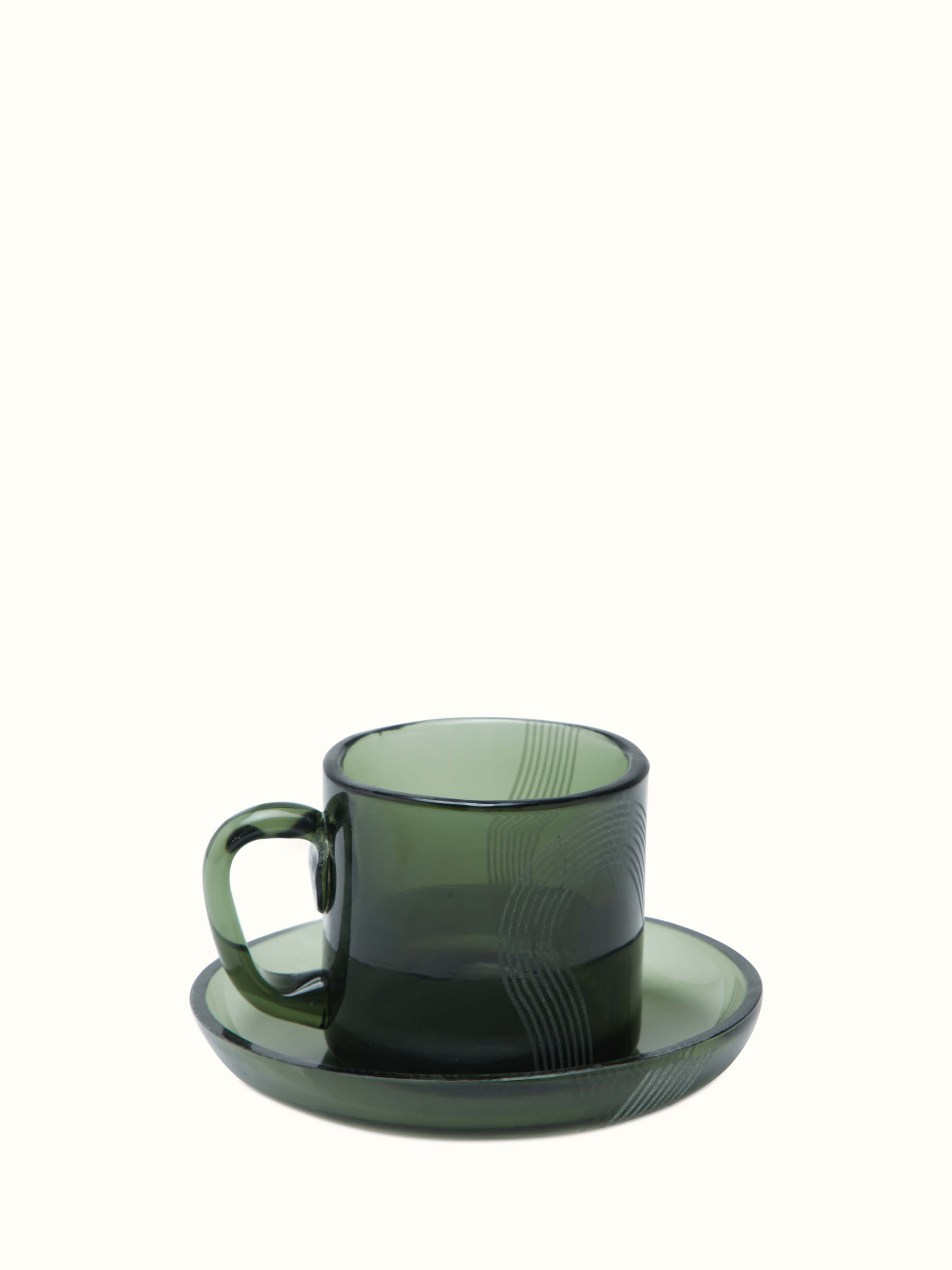 Firozabadi coloured glass teacup with saucer, showcasing its vibrant color and elegant design.