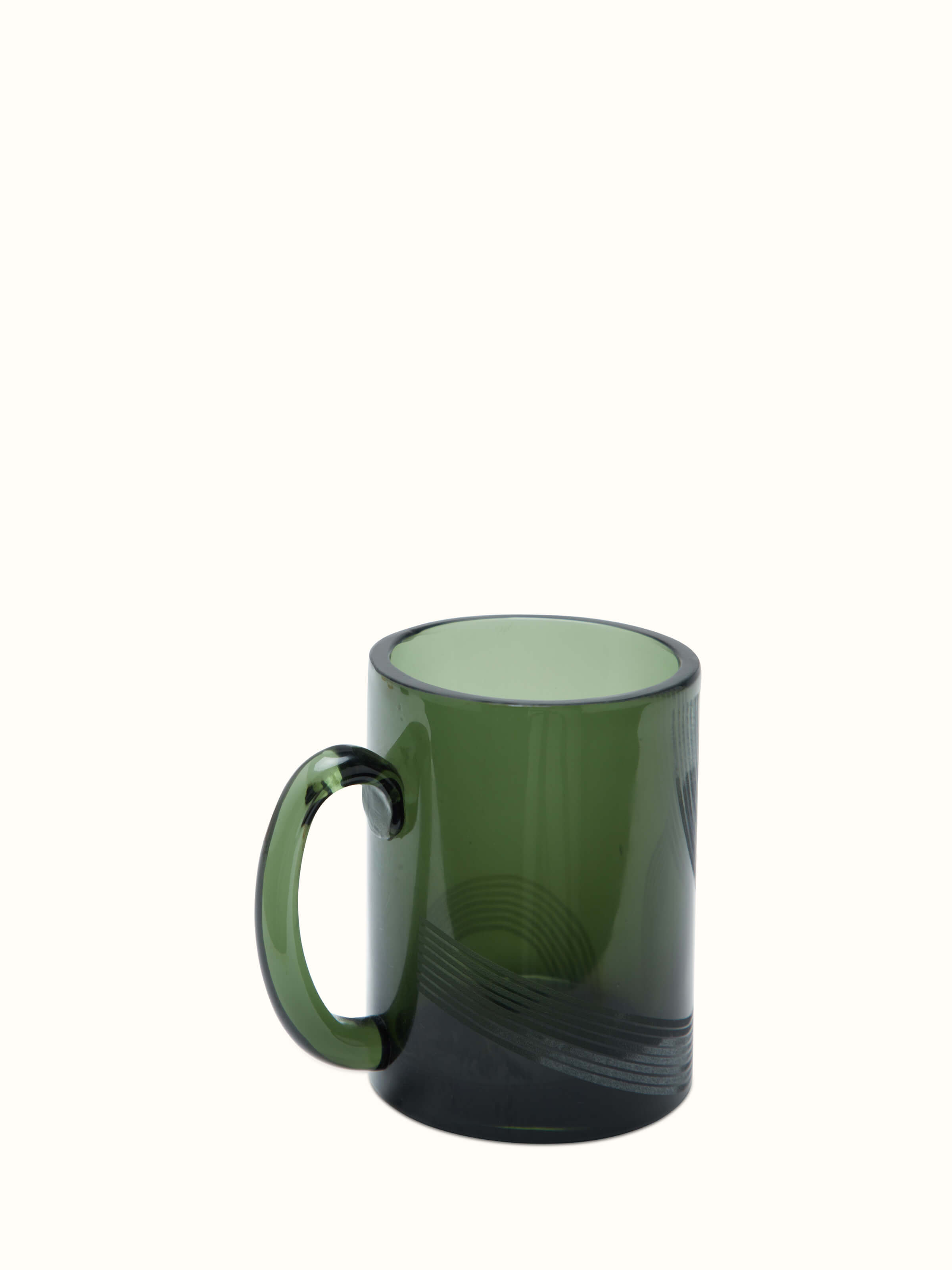Single mug view of Firozabadi green glass coffee mugs highlighting the intricate design and vibrant green hue