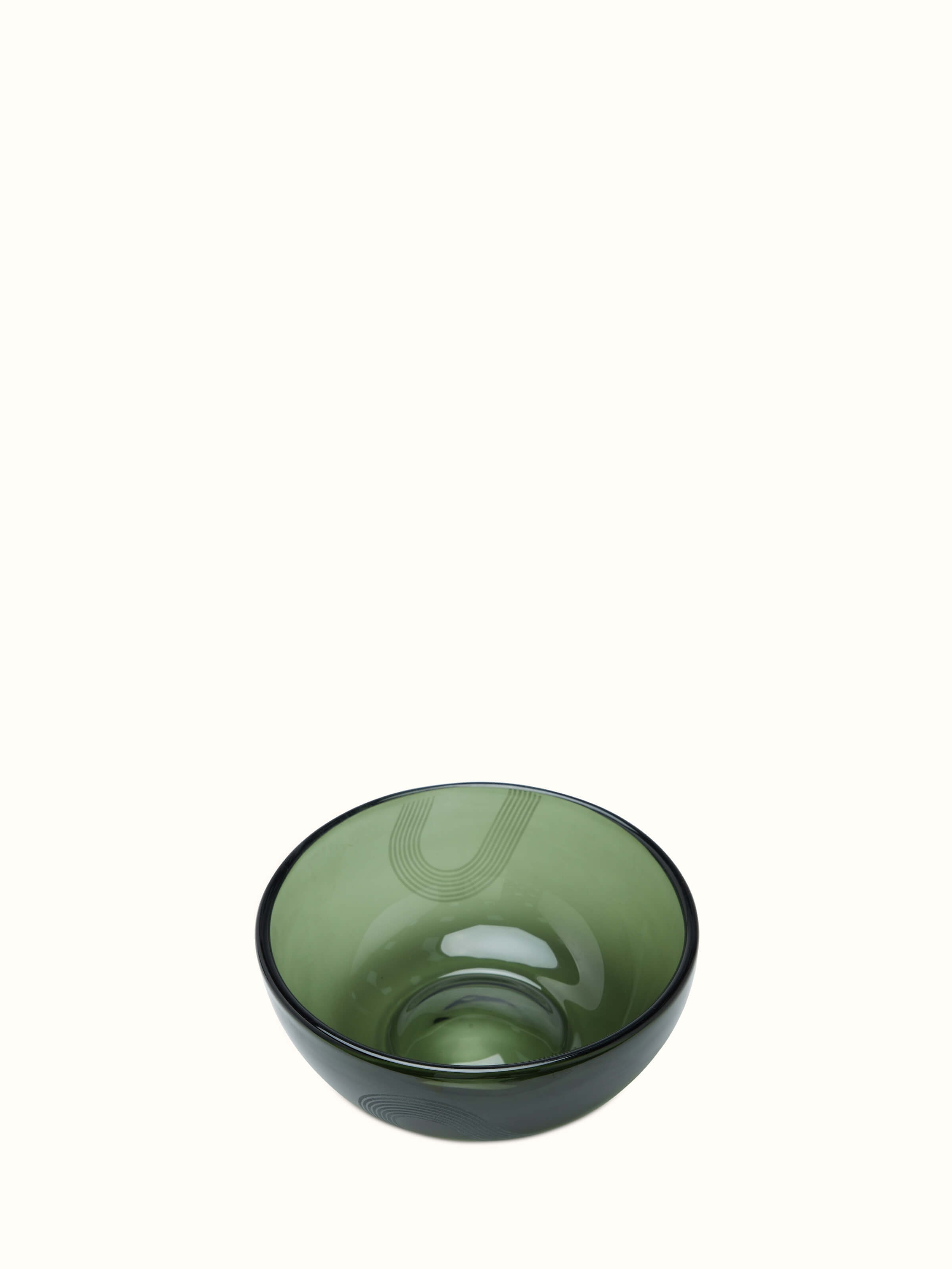 Angle view of large green Firozabadi glass serving bowl highlighting its sturdy build