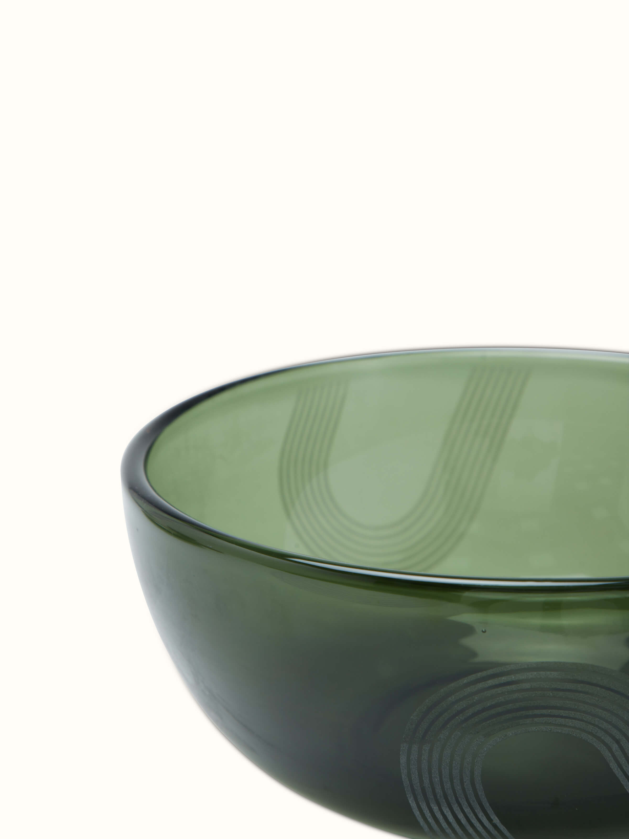 Side view of large green Firozabadi glass serving bowl showing detailed craftsmanship