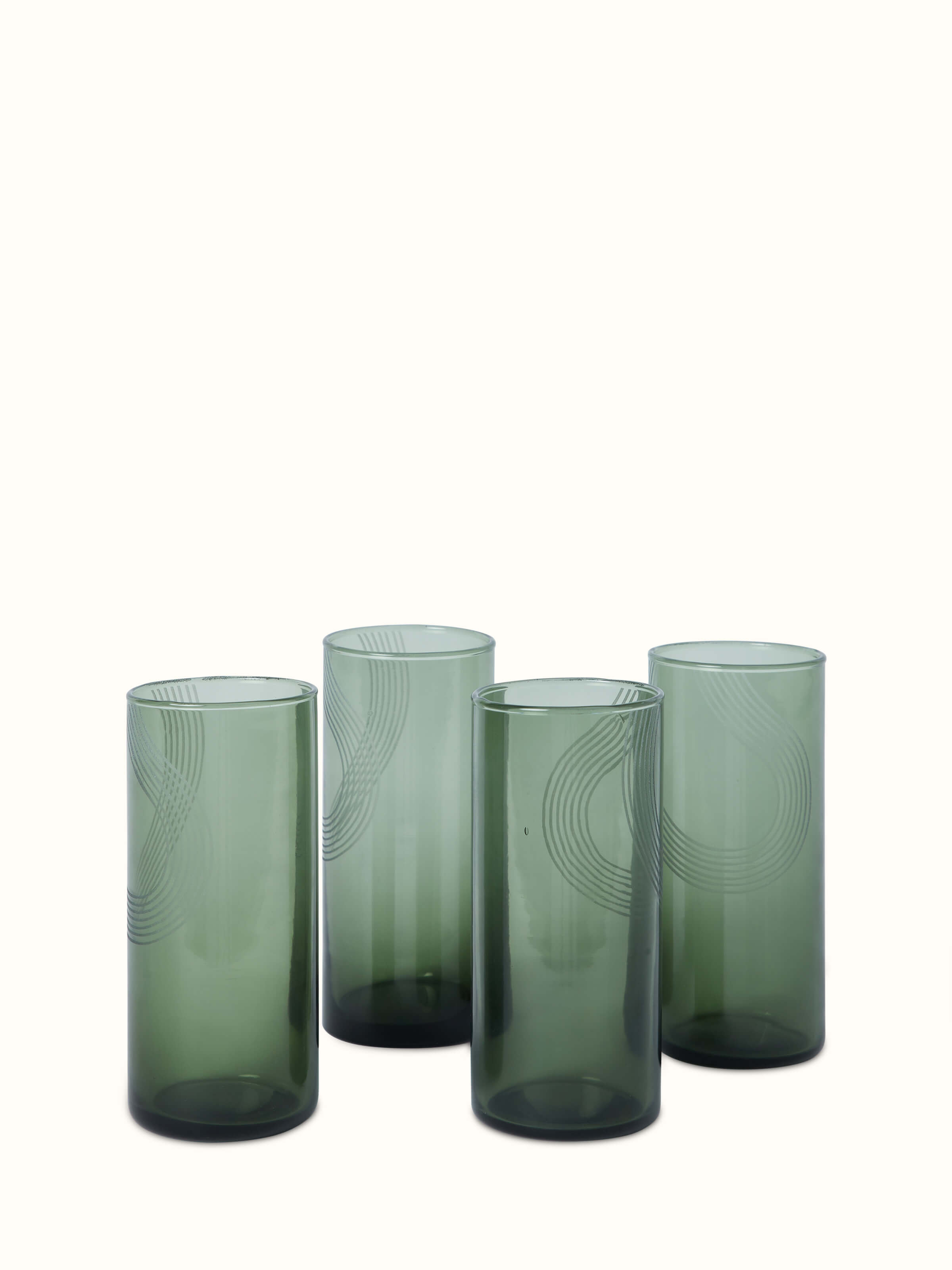 Close-up of Firozabadi green water glasses set (4 pcs) focusing on the intricate glasswork and rich color