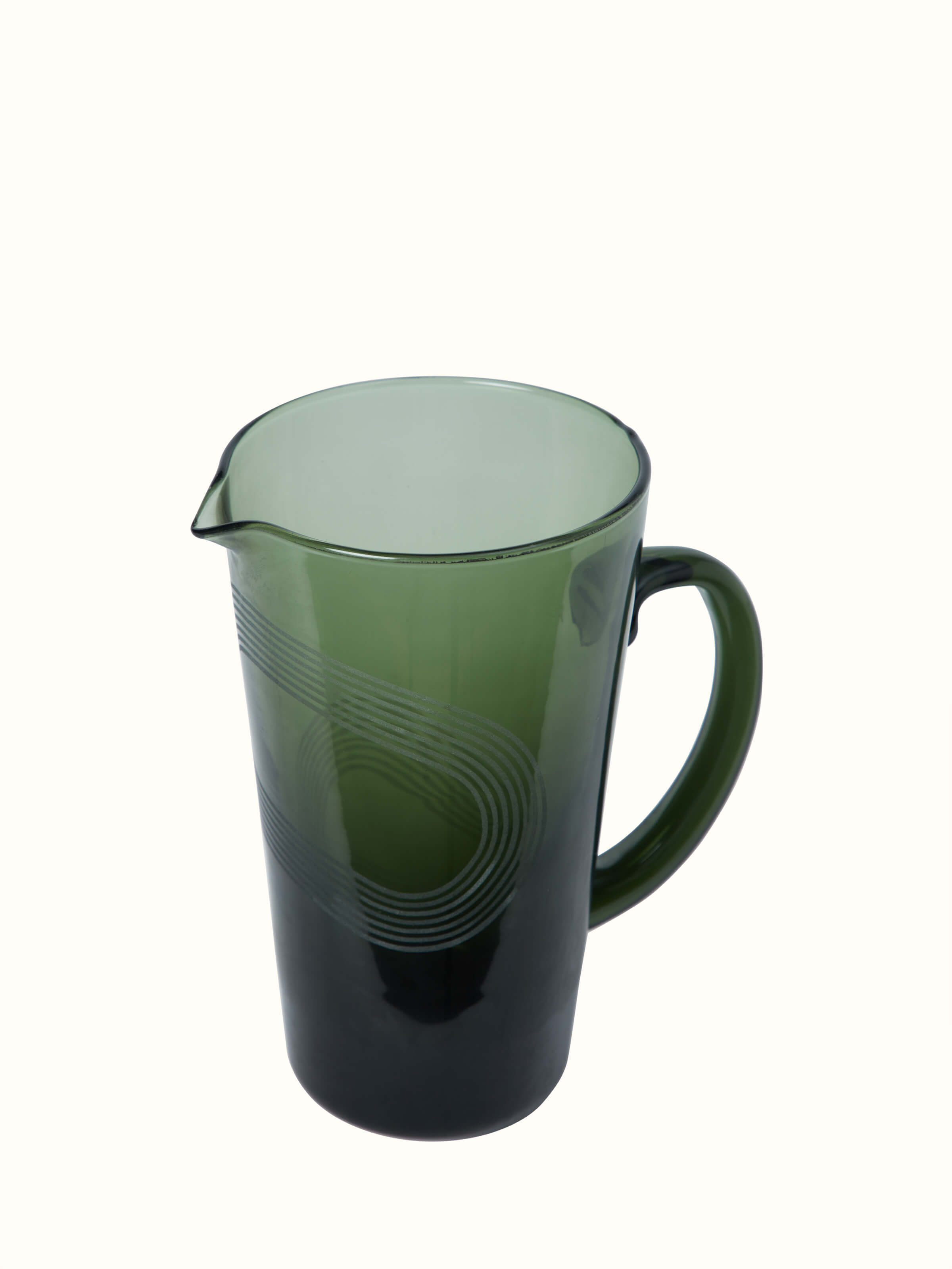 Side view of Firozabadi Glass Pitcher in Green, highlighting the smooth finish and craftsmanship