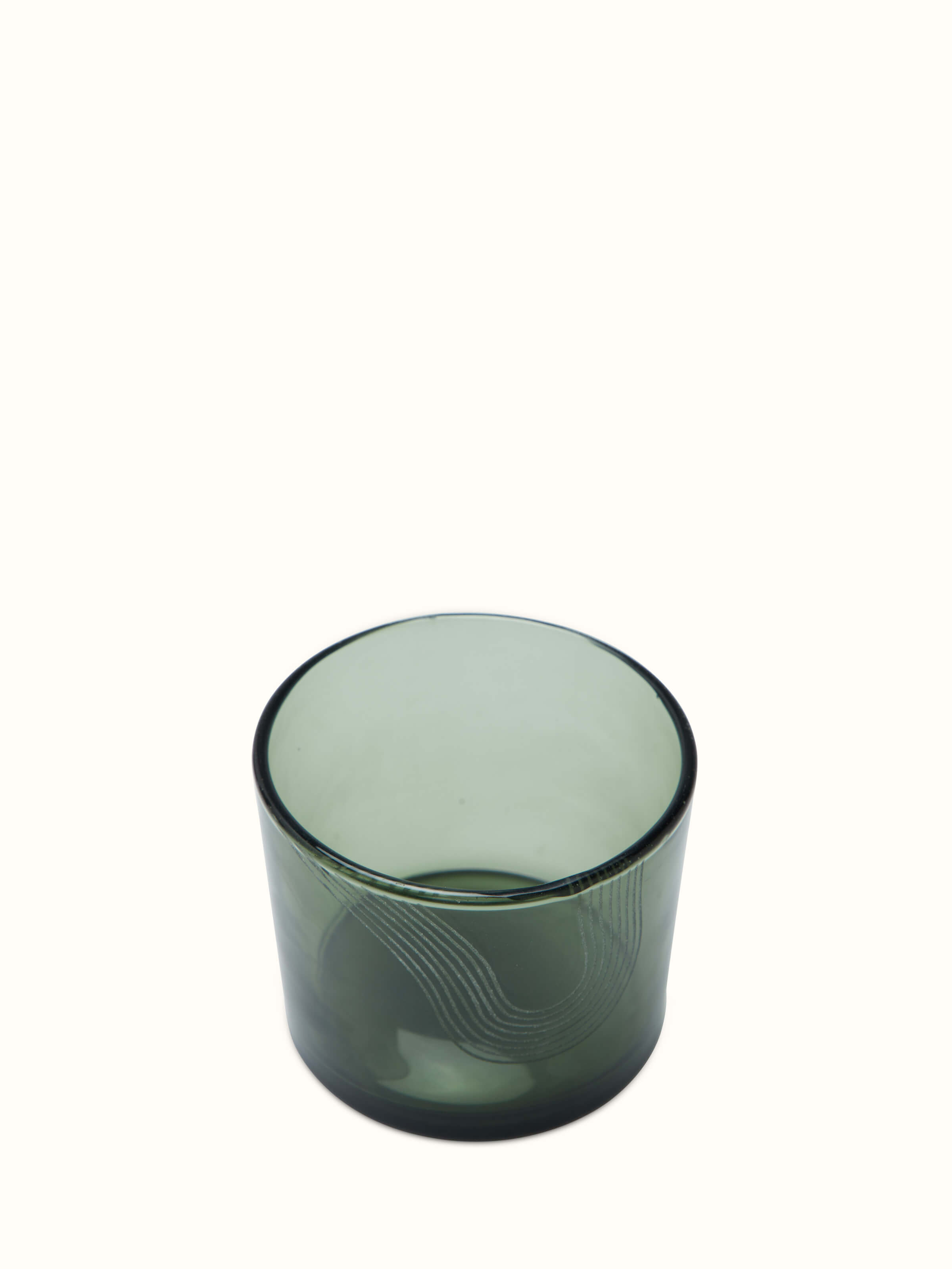 Angled view of Firozabadi Green Glass Carafe