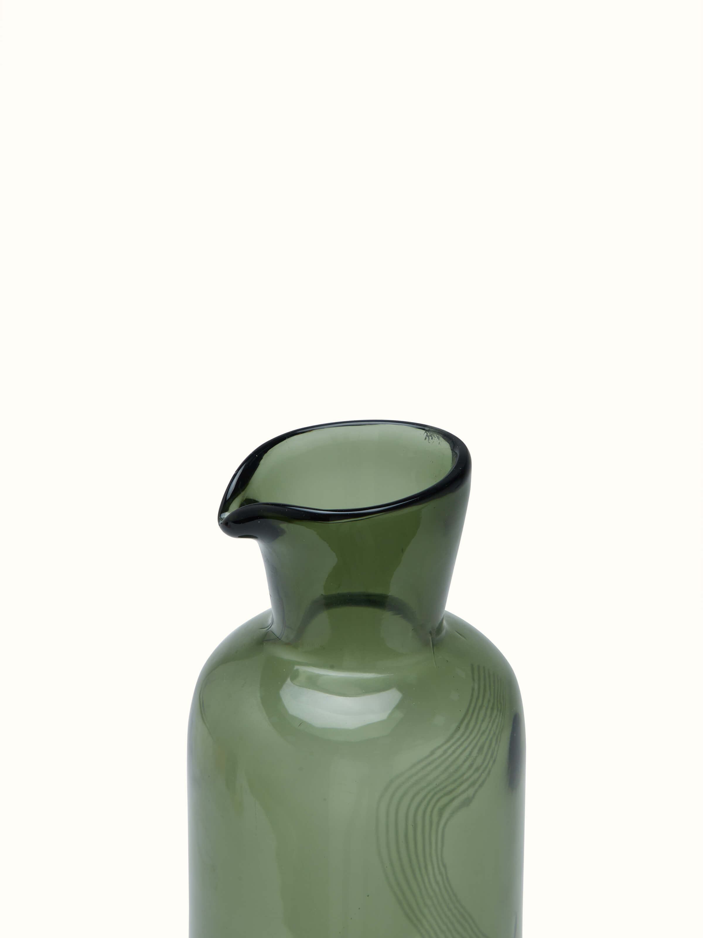 Detail view of Firozabadi Green Glass Carafe