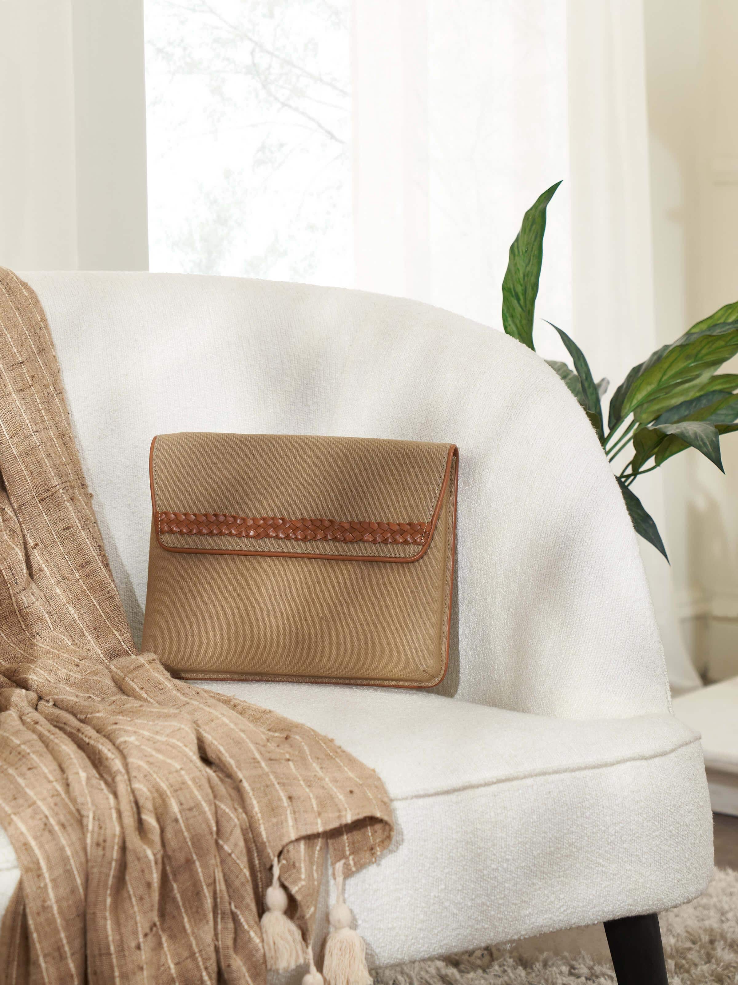 Side view of Leather Laptop Bag for MacBook 13, showcasing the bag's profile and craftsmanship