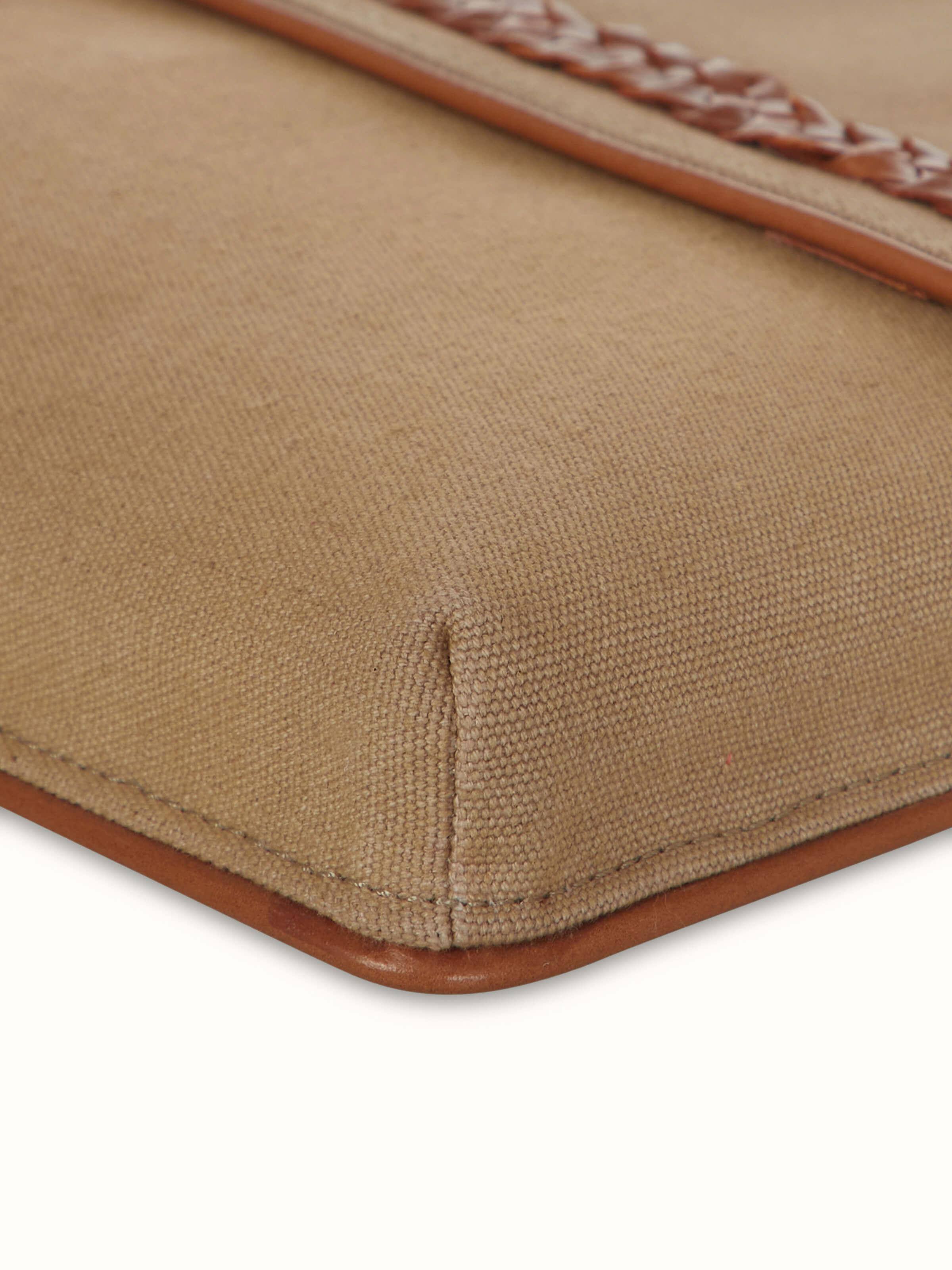 Close-up of Leather Laptop Bag for MacBook 13, highlighting the leather texture and detailing