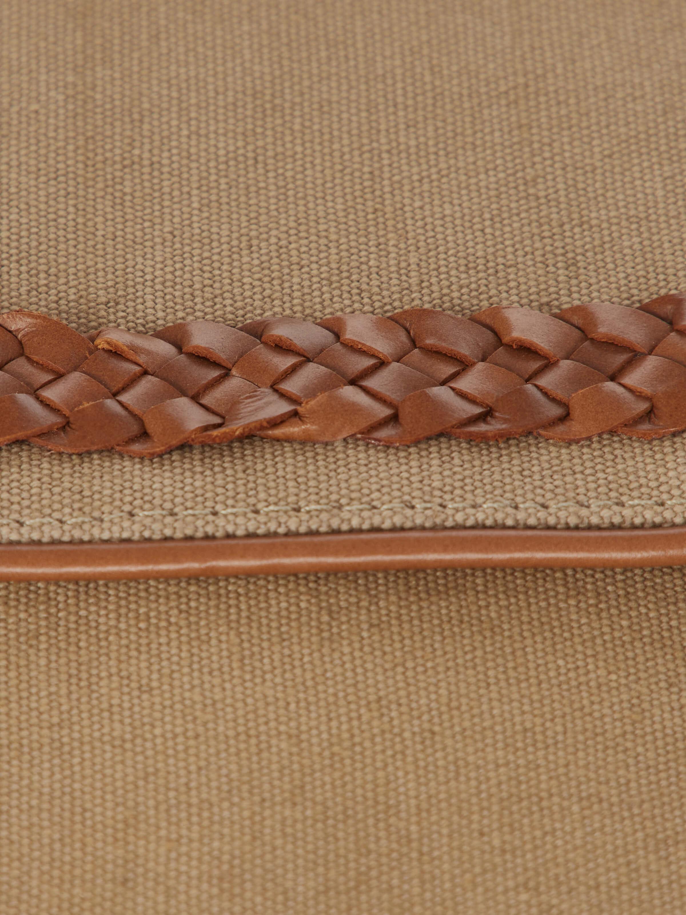 Back view of Leather Laptop Bag for MacBook 13, emphasizing the design and closure features