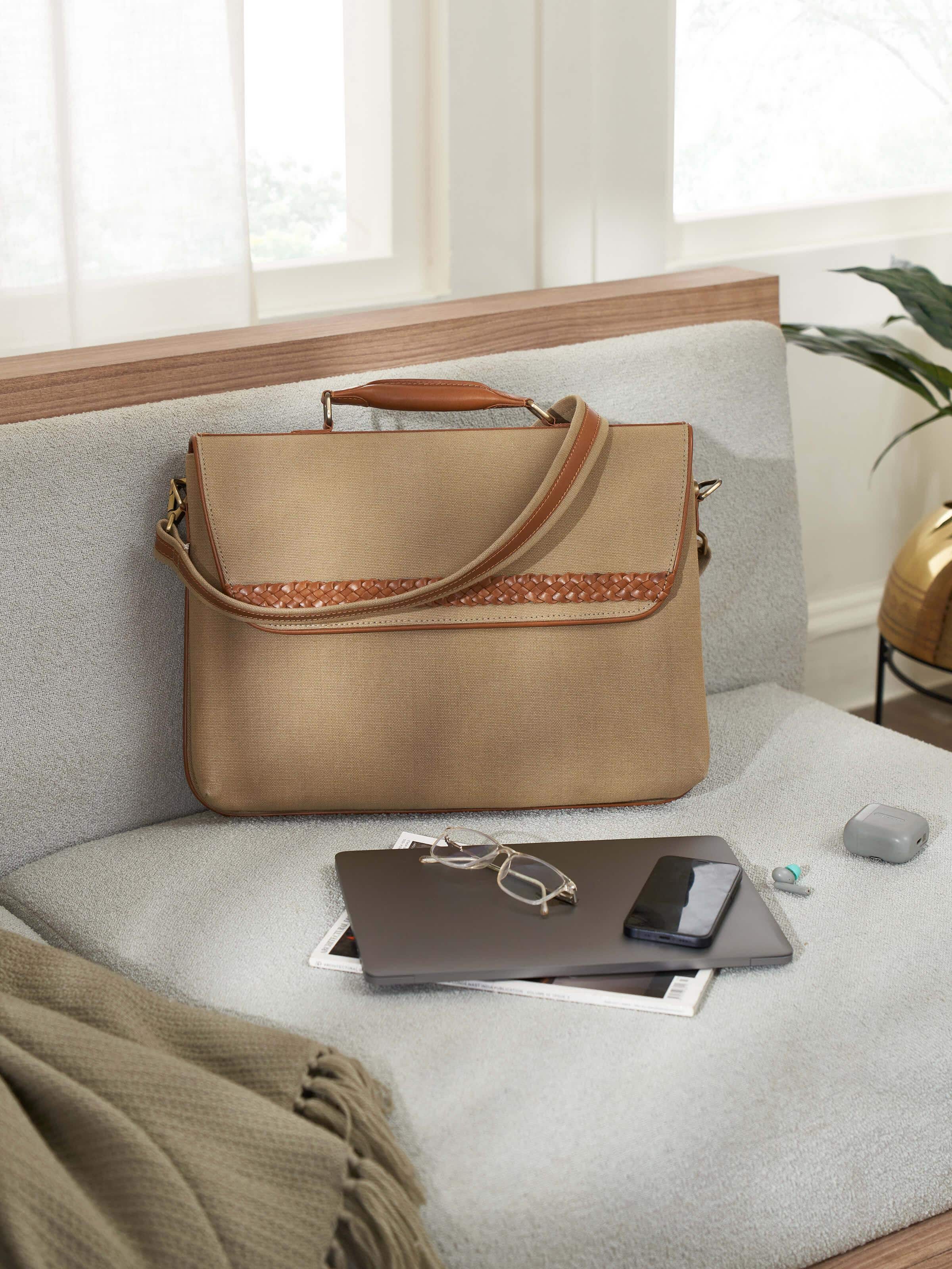 Side view of Leather laptop bag showing its elegant profile and high-quality leather.