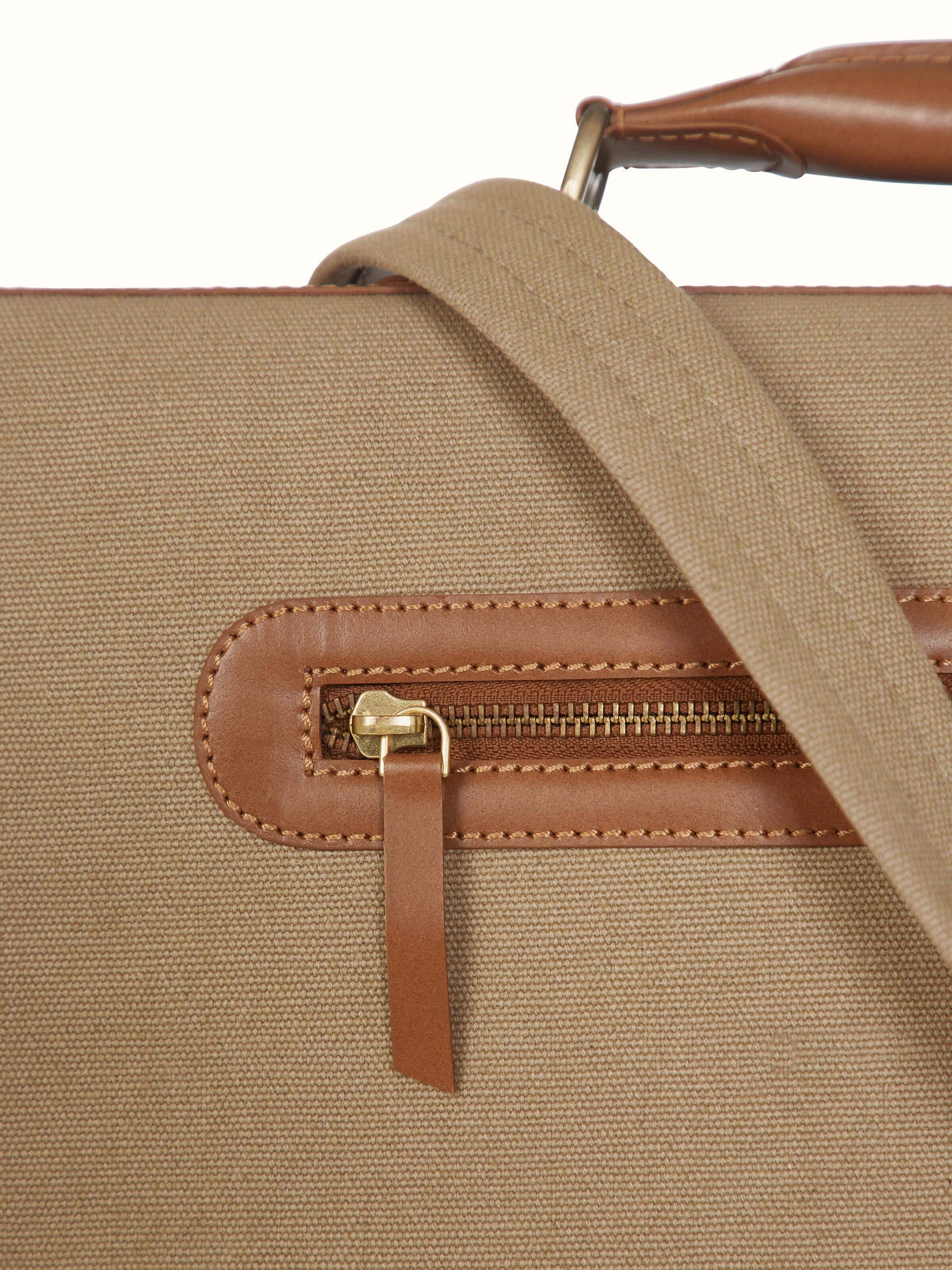 Detailed view of Leather laptop bag highlighting the premium leather finish and hardware.