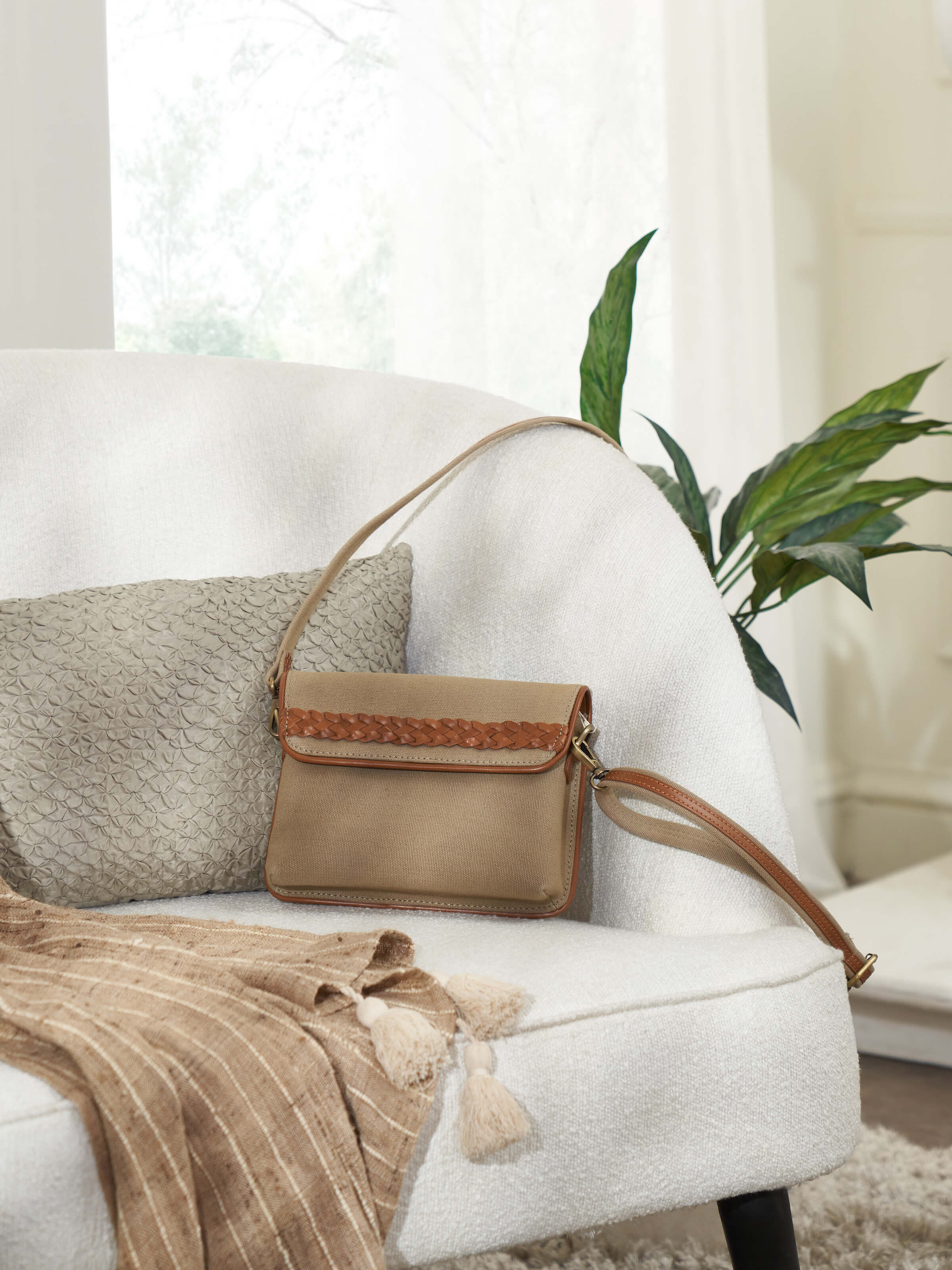 Side view of slim Leather laptop bag highlighting its compact size and elegant leather finish