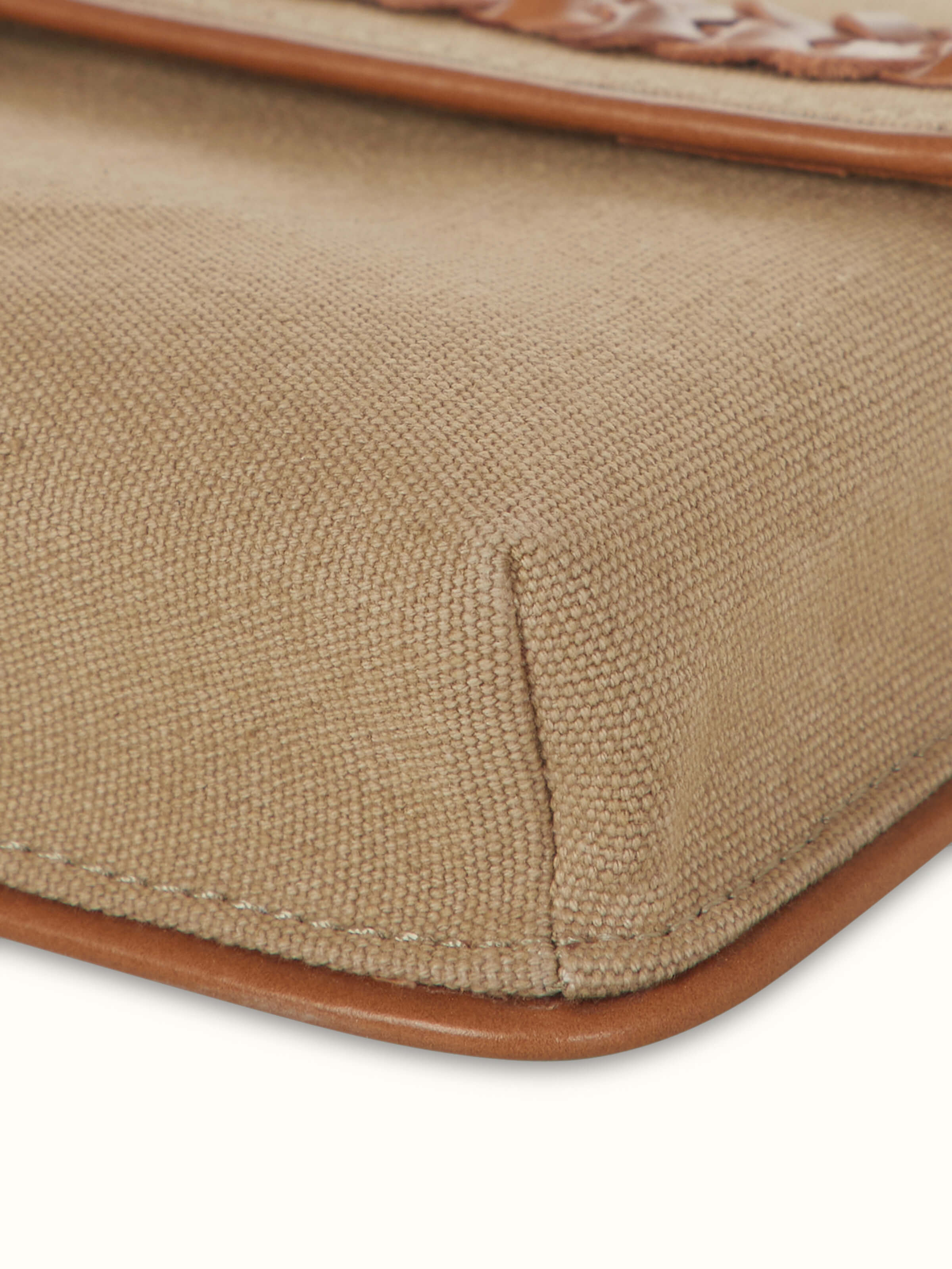 Detailed view of slim Leather laptop bag showcasing its stylish design and functional compartments