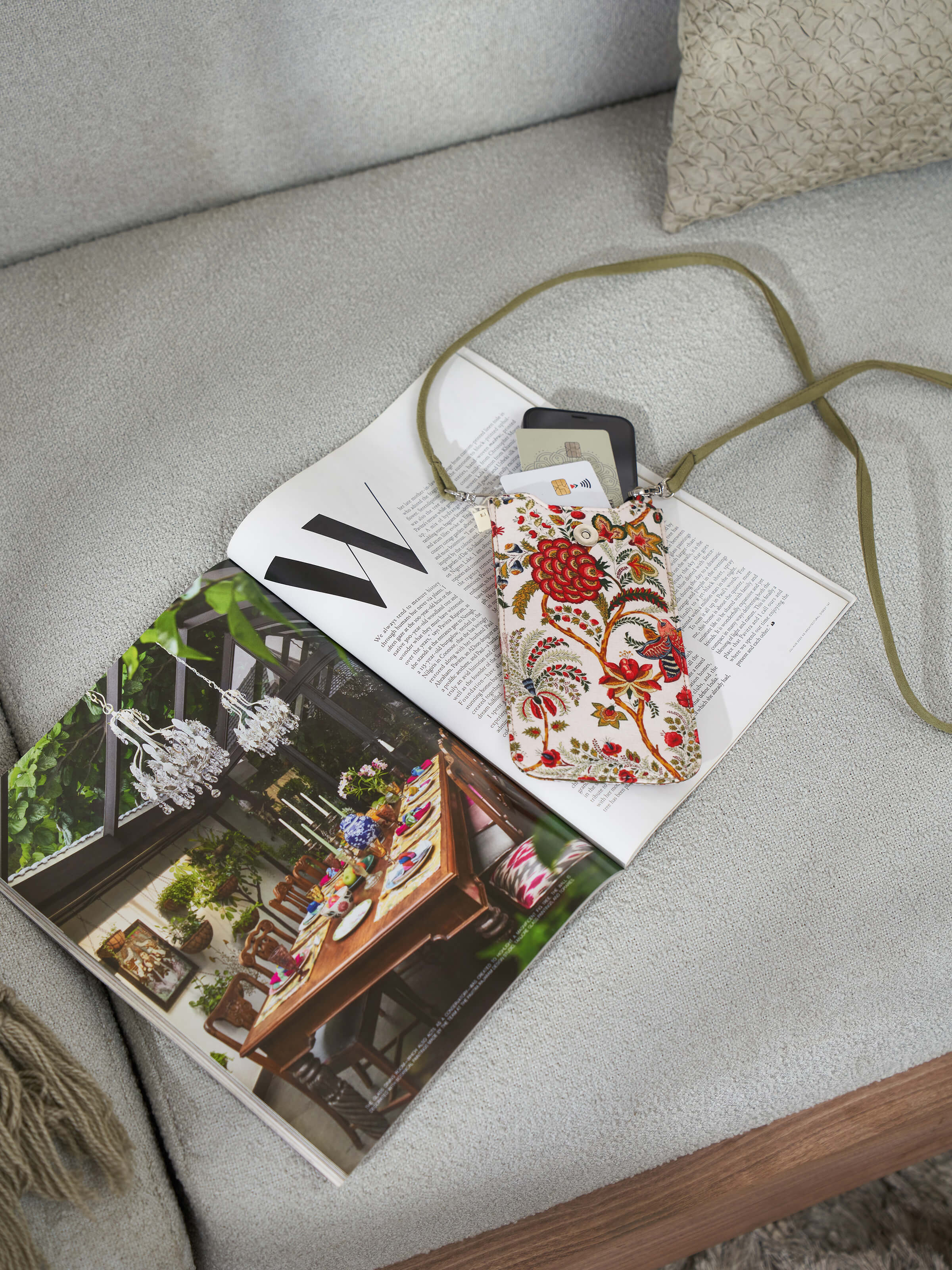 Side view of red leather mobile case, highlighting the craftsmanship and quality of the leather.