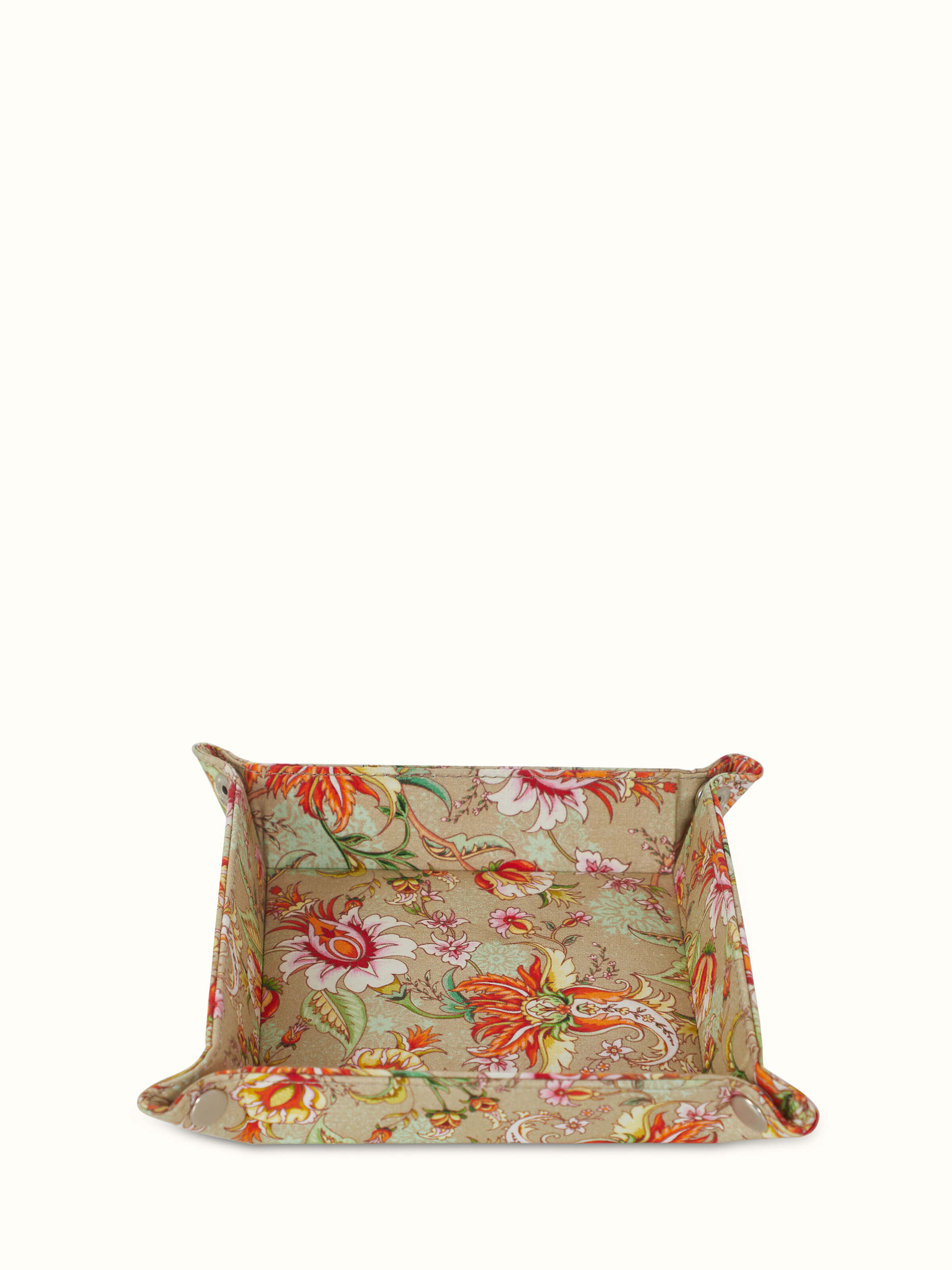 Front view of orange leather valet tray showcasing its elegant design and high-quality leather