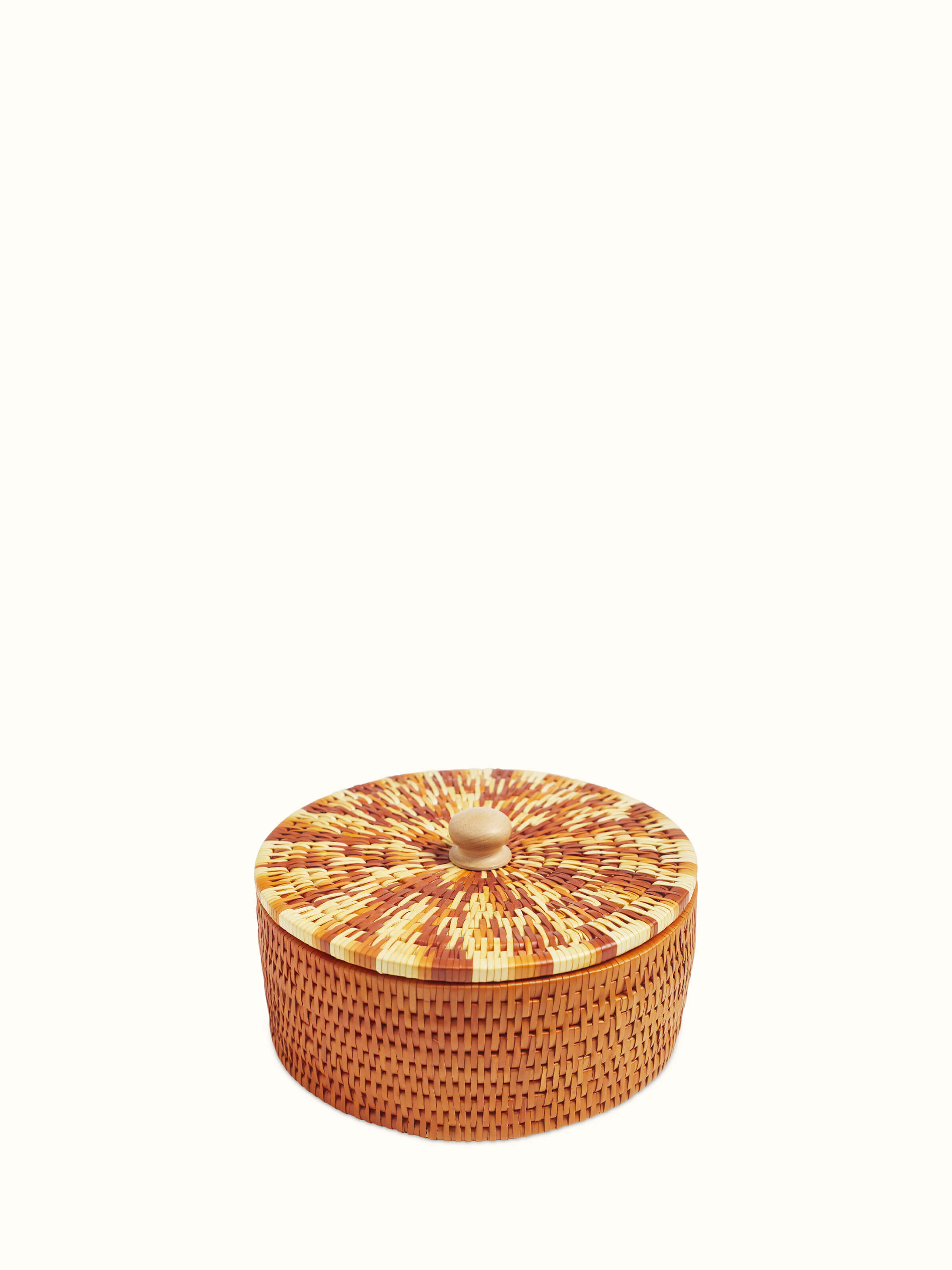 Front view of palm leaf woven roti box in brown, highlighting the intricate woven design and natural texture