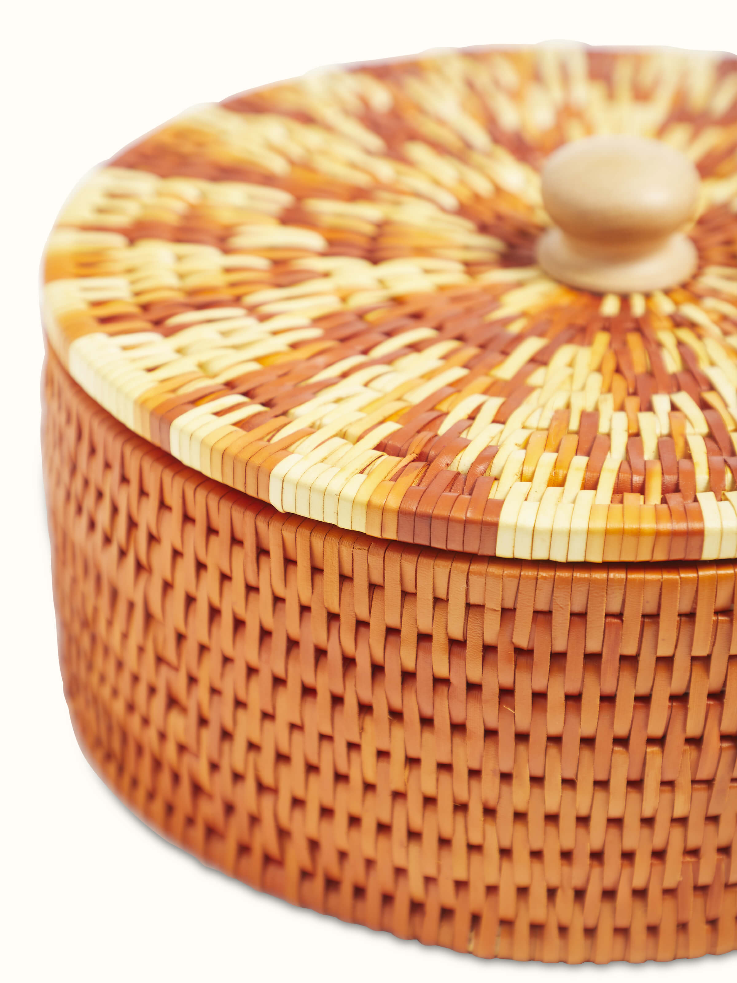 Close-up of palm leaf woven roti box in brown, emphasizing the craftsmanship and natural palm leaf material