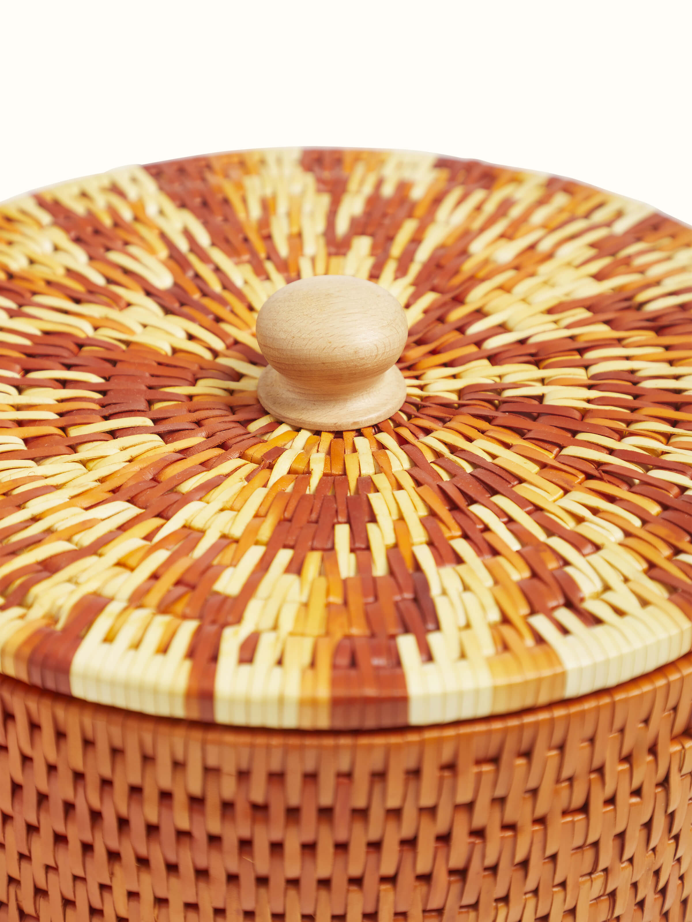 Detailed view of palm leaf woven roti box in brown, focusing on the texture and artisanal weaving details