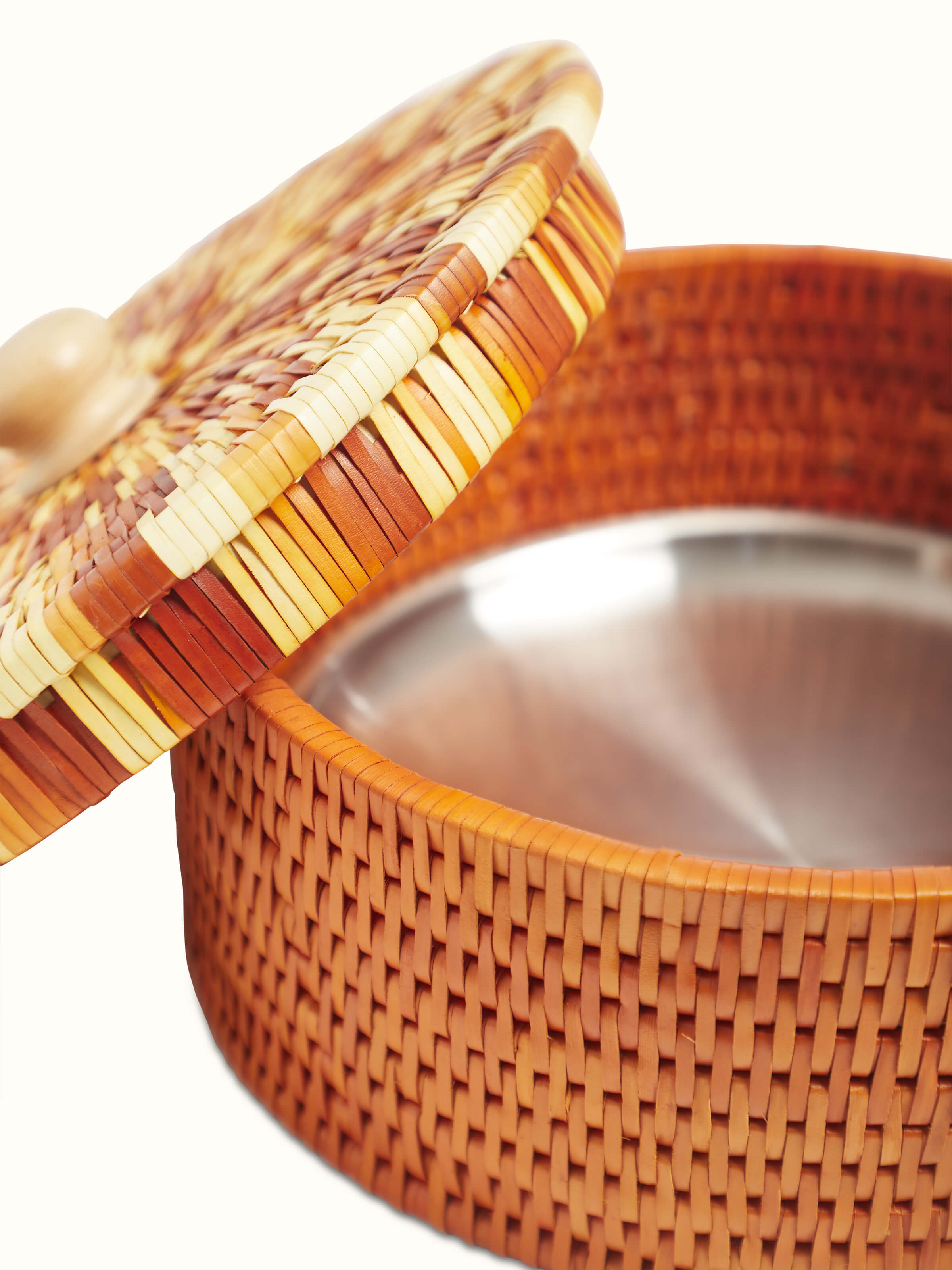 Angled view of palm leaf woven roti box in brown, displaying the box's elegant design and robust construction