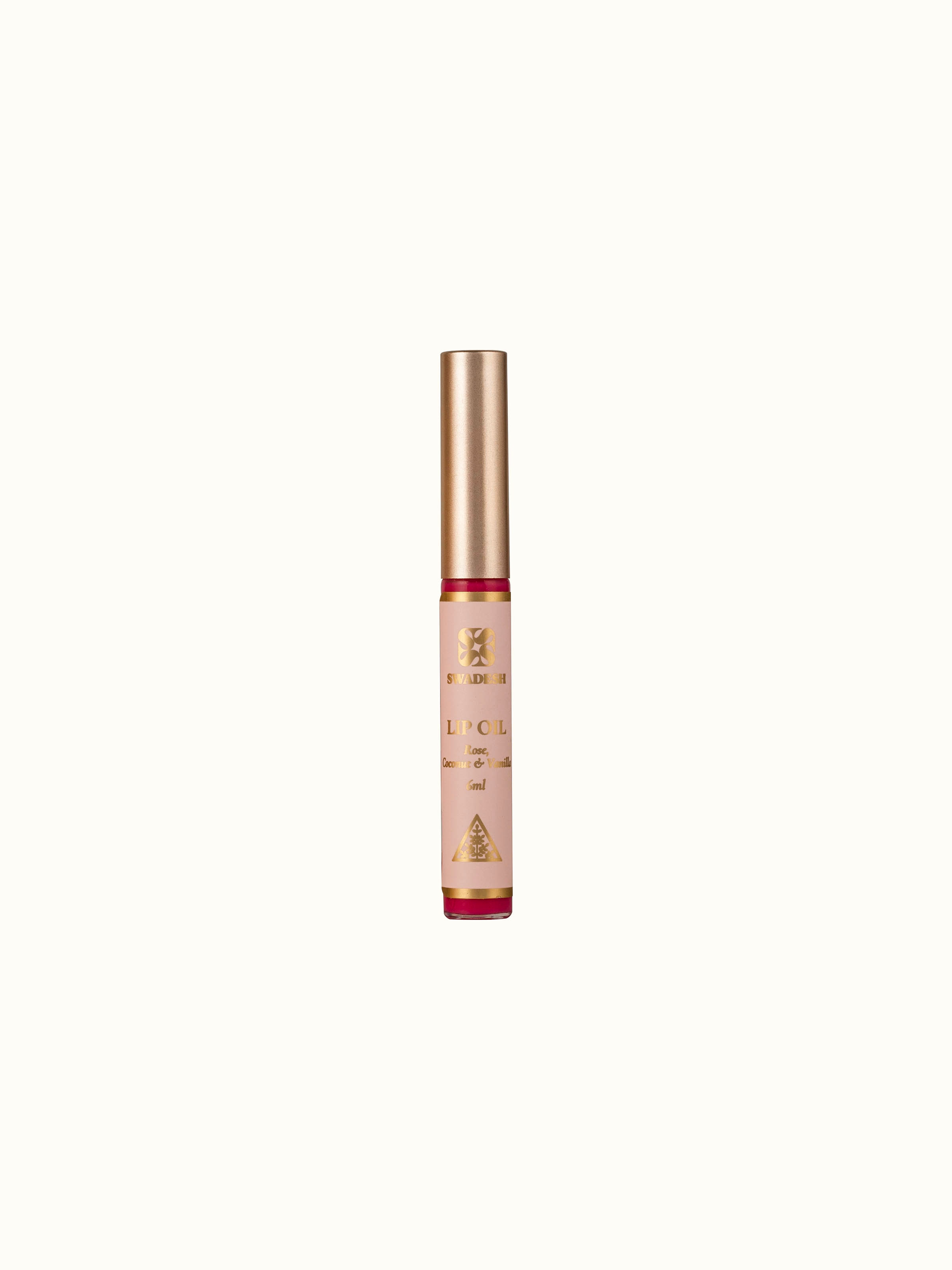 Front view of Lip Oil Rose, Coconut & Vanilla showcasing its elegant bottle design and vibrant color