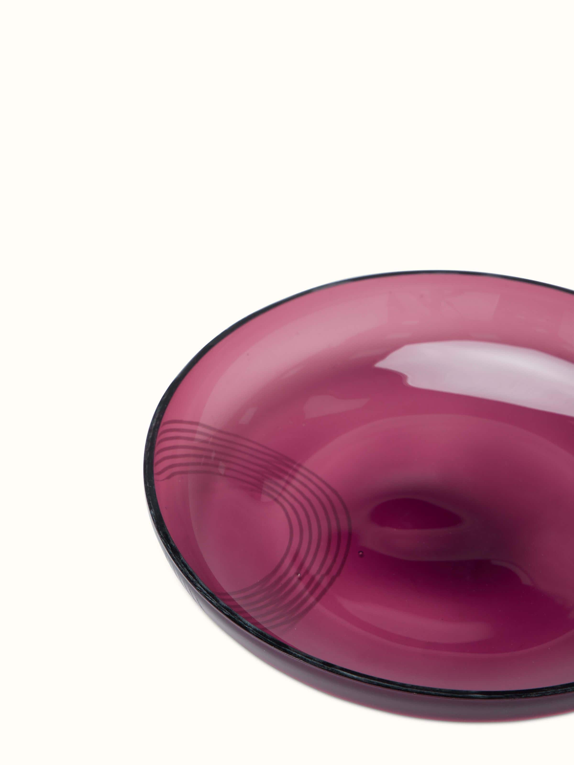 Detailed close-up of Firozabadi glass salad plate in purple, emphasizing its delicate glasswork and glossy finish.