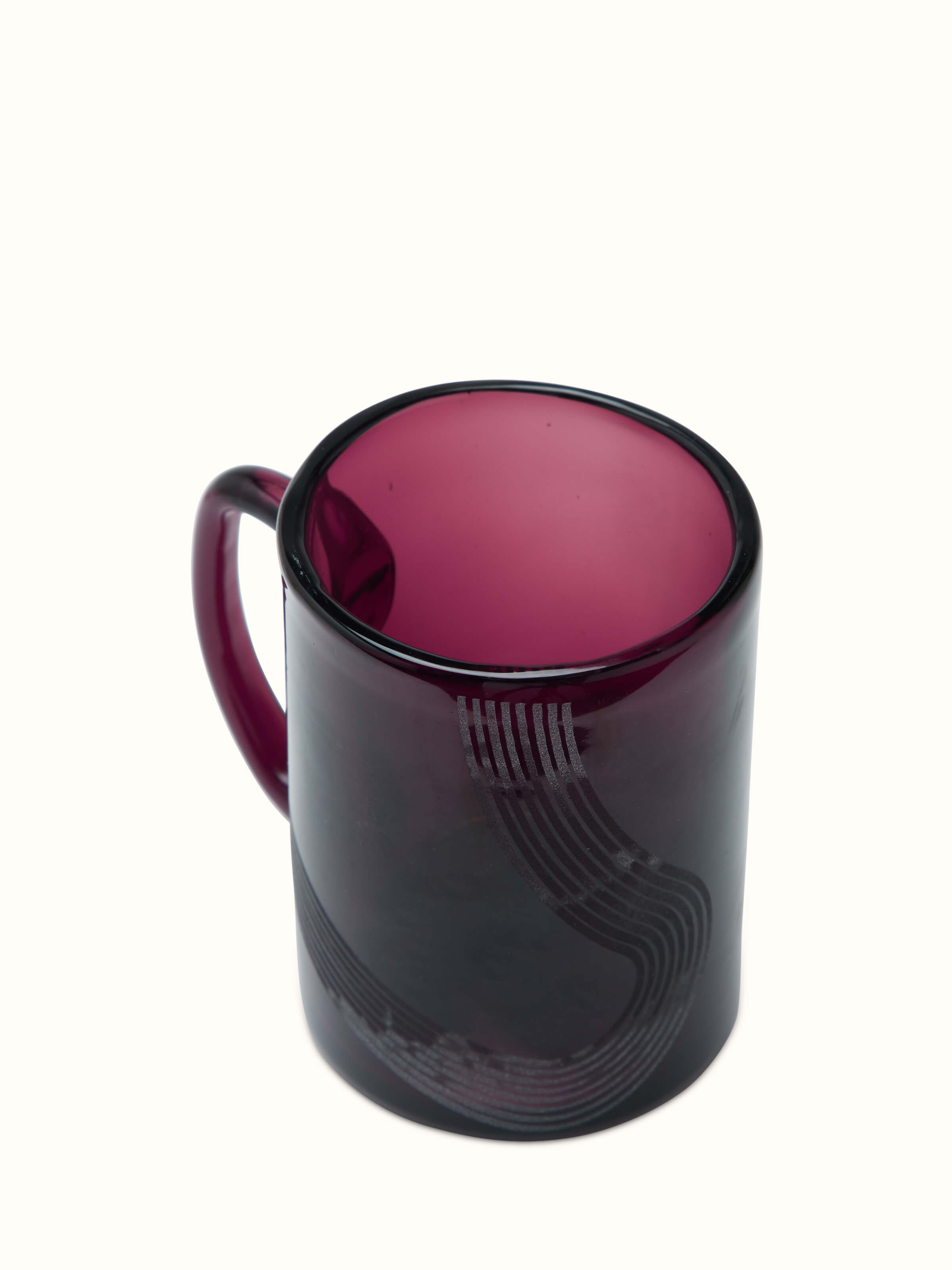 Side view of Firozabadi Glass Coffee Mugs in magenta, highlighting the mug's shape and color.