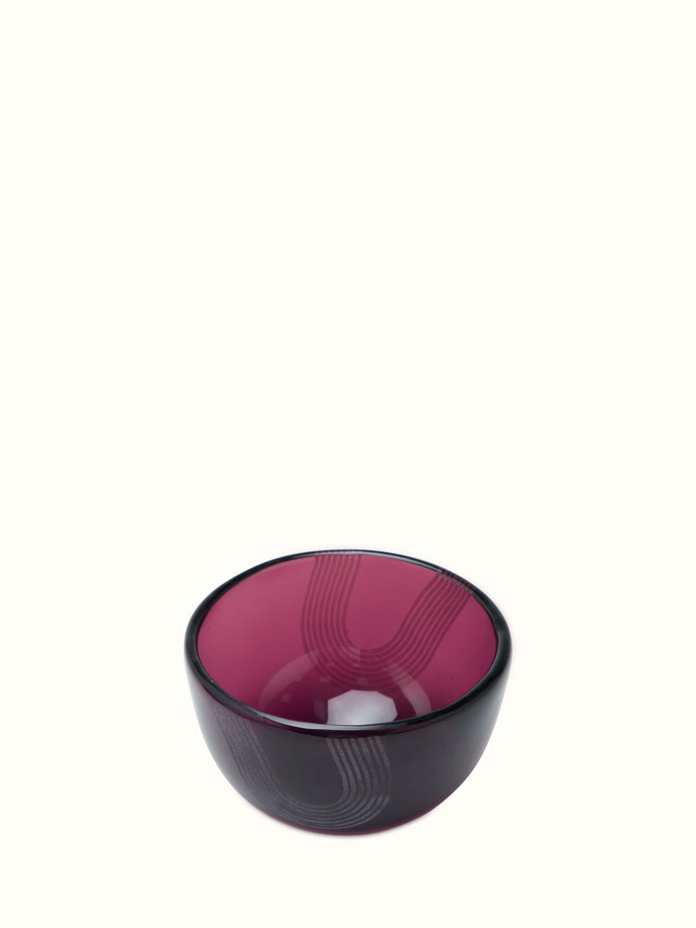 Angle view of Firozabadi glass nut bowls in purple, set of 2, showcasing the refined glasswork